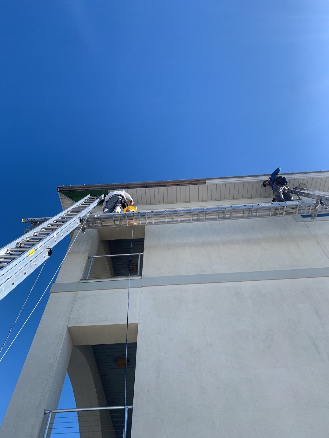 Soffit and Fascia Roof Replacement using 60' Ladders in Navarre by Gutter Professors