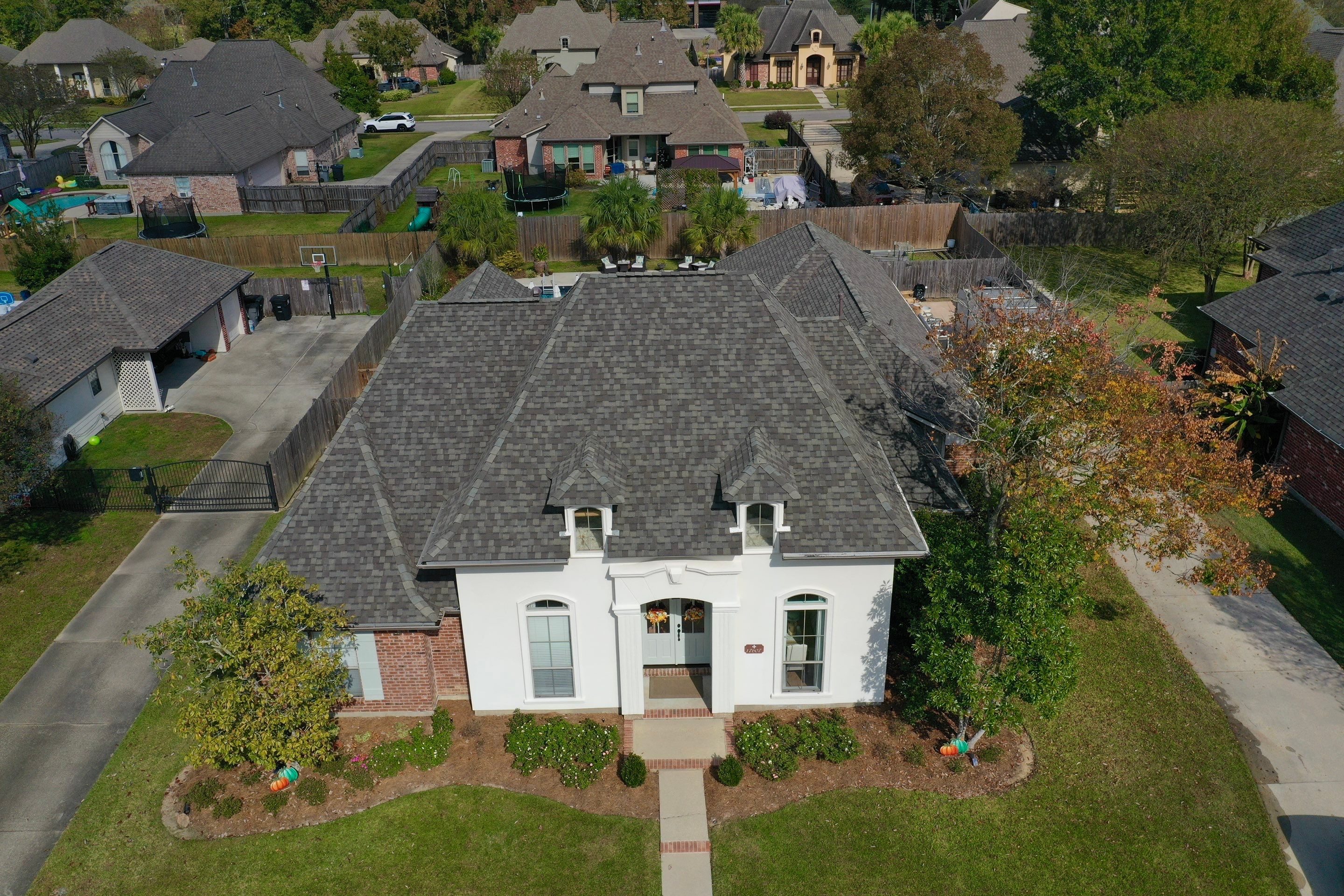 Certainteed Landmark Weathered Wood w patio extension by Top Team Roofing & Construction