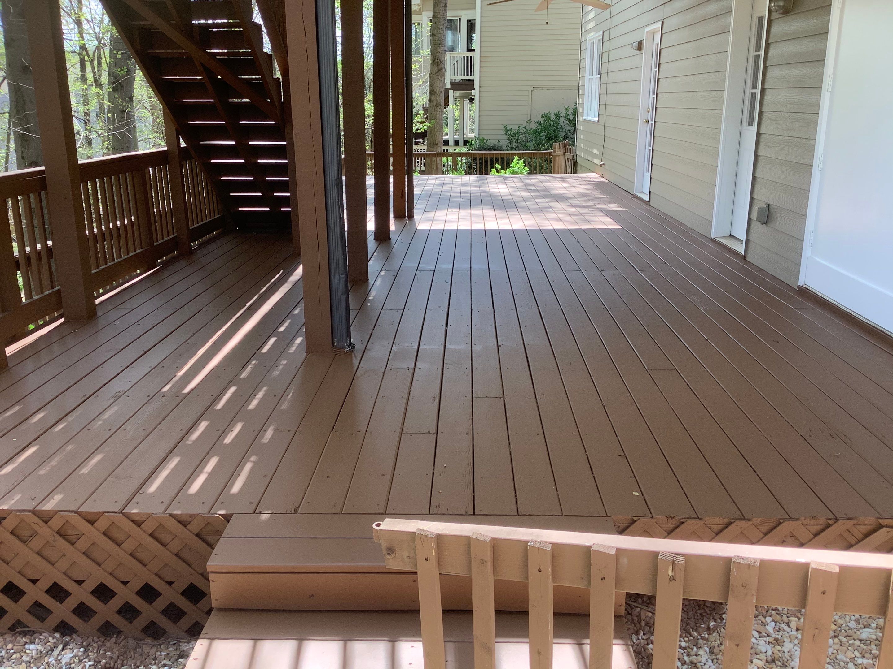 Residential Exterior Painting and Deck Refinishing Project in Kennesaw by Swift Home Renovations