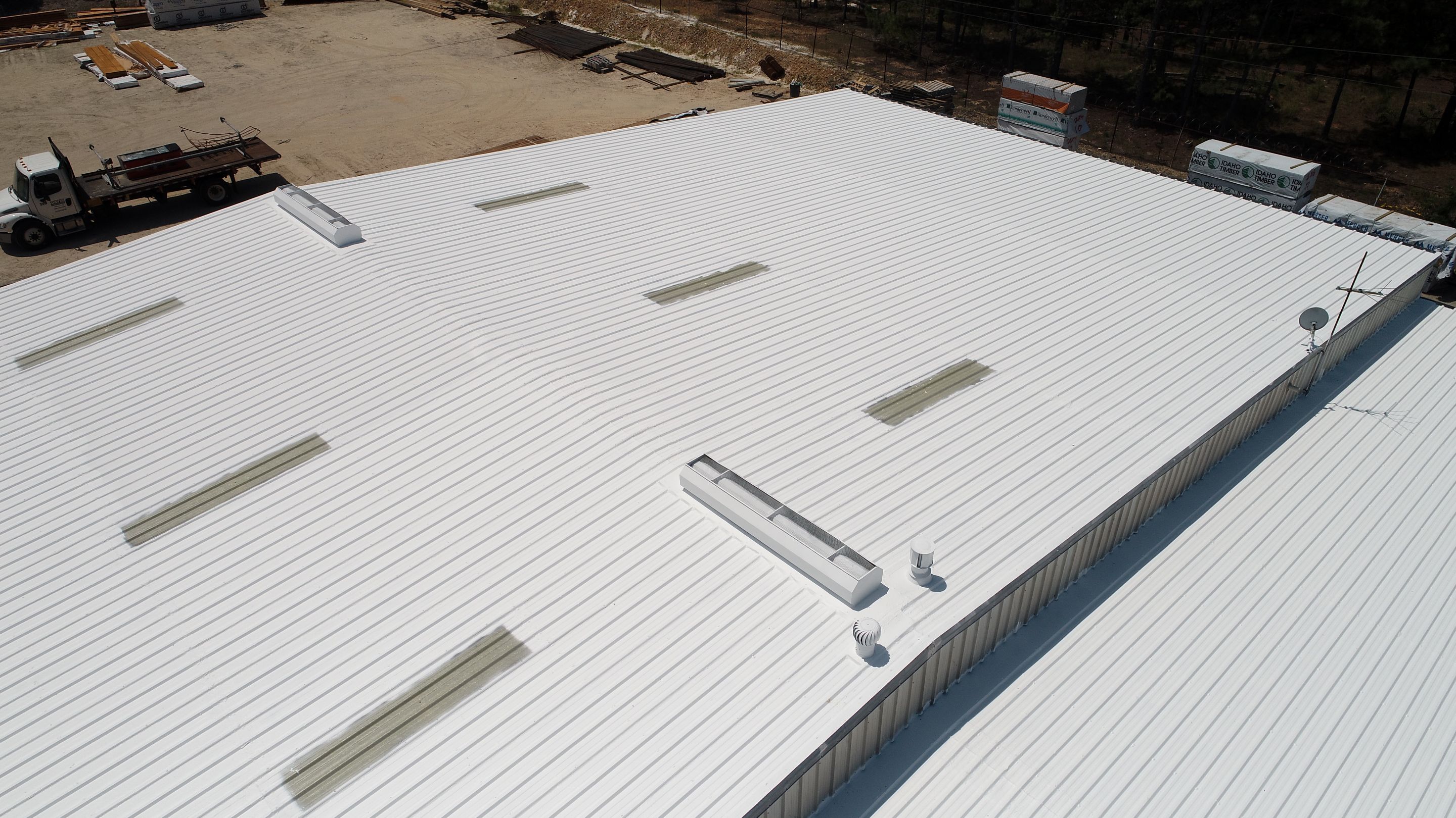 Commercial Roofing Installation using Aldocoat Coatings by Hostetler Roofing
