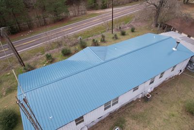 Residential Roofing Installation using 29 gauge metal