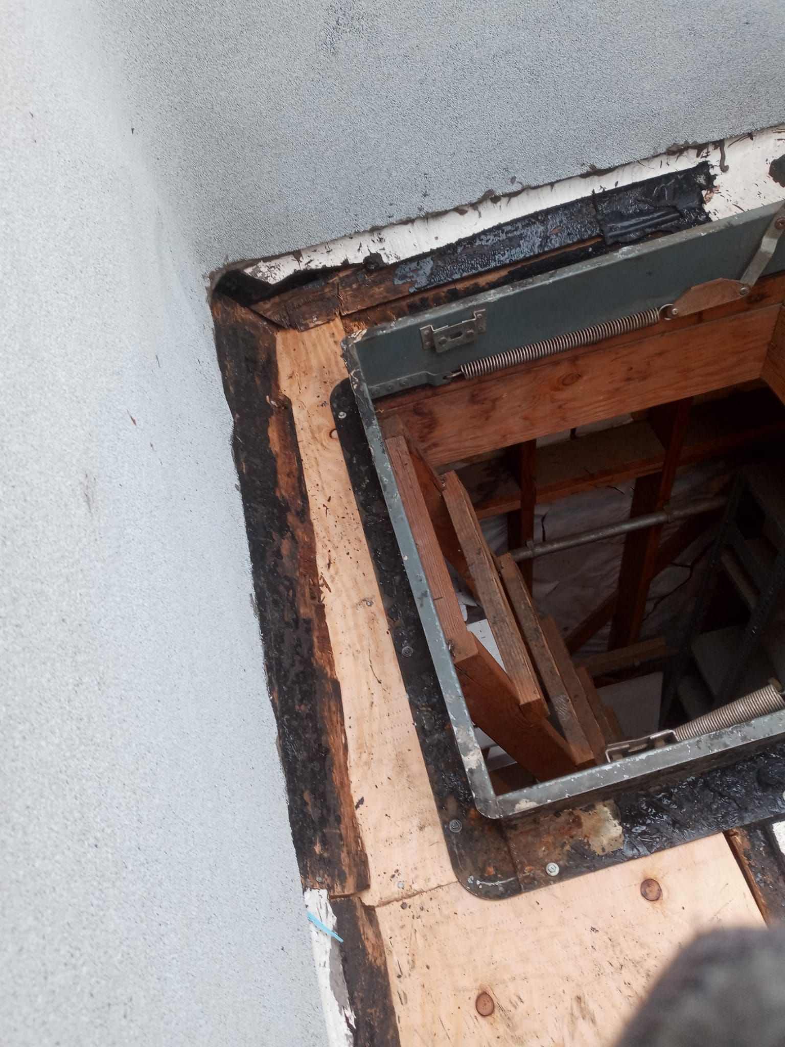 Spray foam and coatings inside commercial building HVAC well using Spray foam and coatings over existing BUR system by Straight Edge Roofing Inc