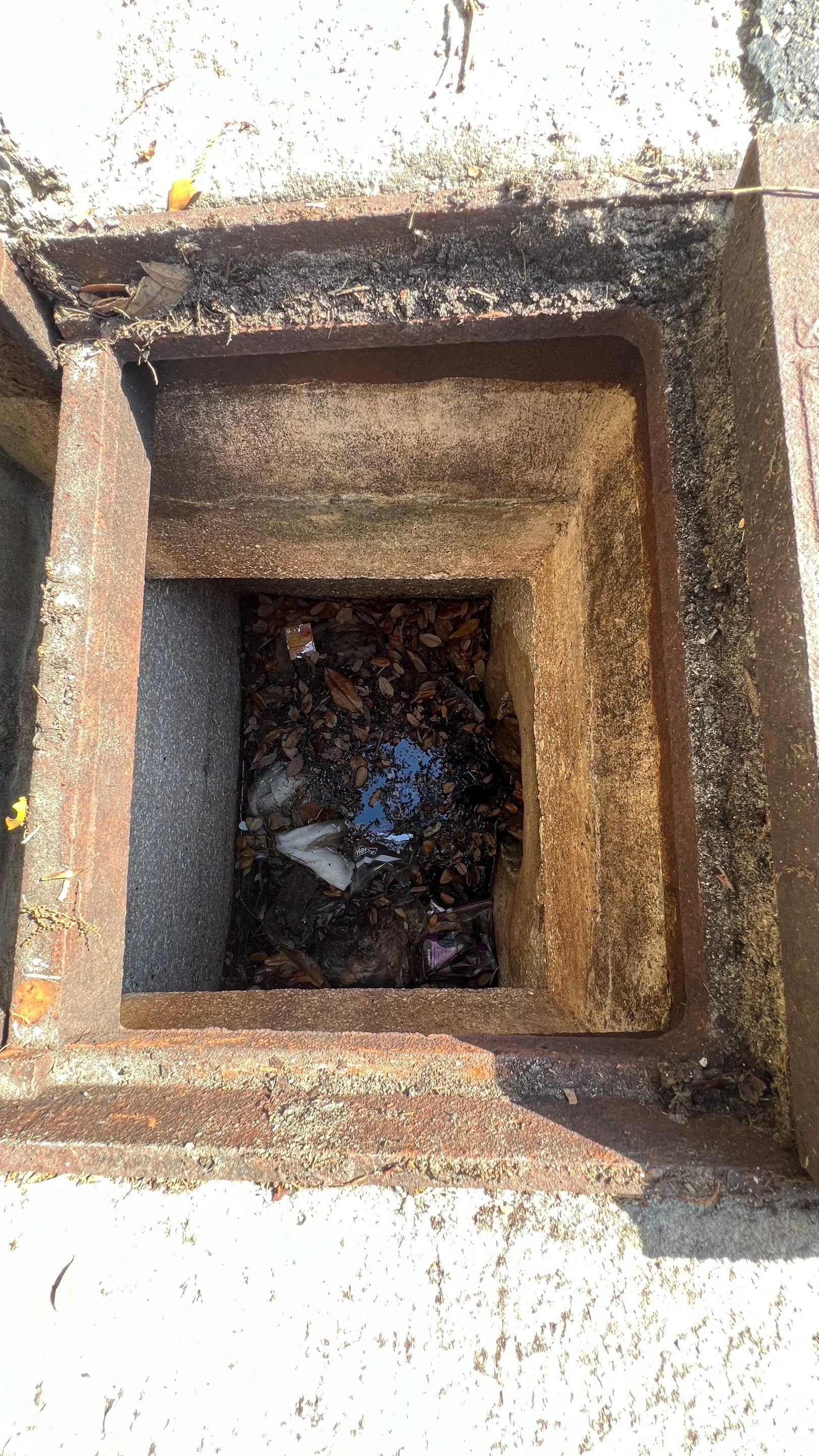 Cleaning Debris Filled Catch Basins by APS Power & Water