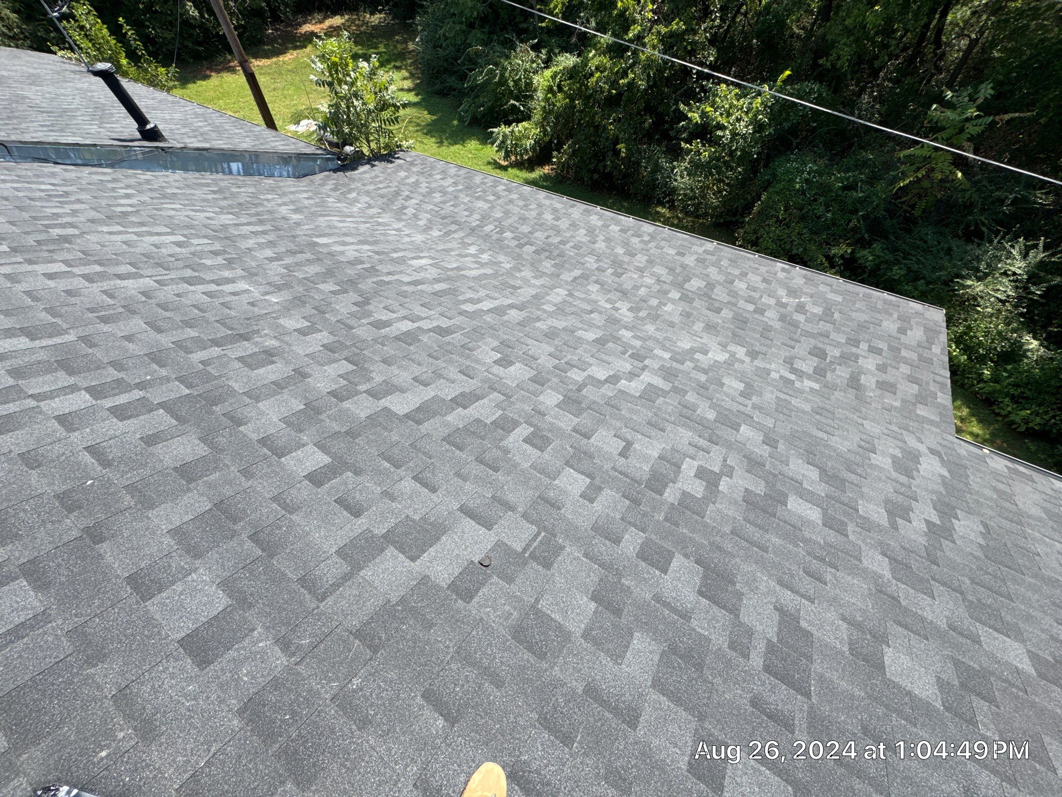 Reroof using IKO Granite Black by Castillo Roofing