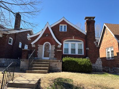 Full Residential Roof Installation and Detached Garage Shingle Replacement in St. Louis
