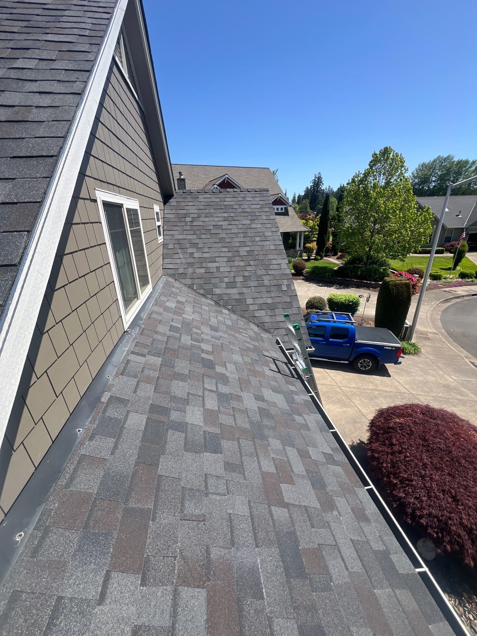 Residential Roofing Installation using Malarkey Vista (Color: Black Oak) by Orezona Building & Roofing Company, Inc.