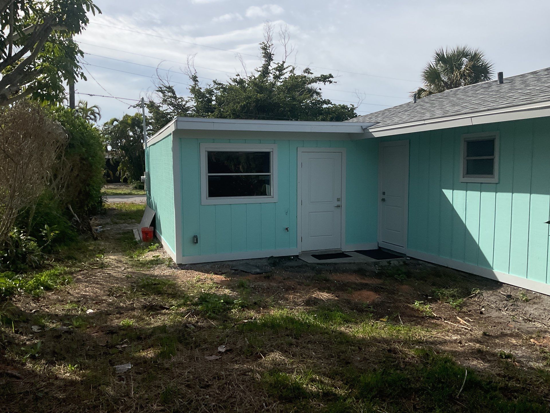 White Seamless Gutters Installation in Sanibel FL by Gutter Professors