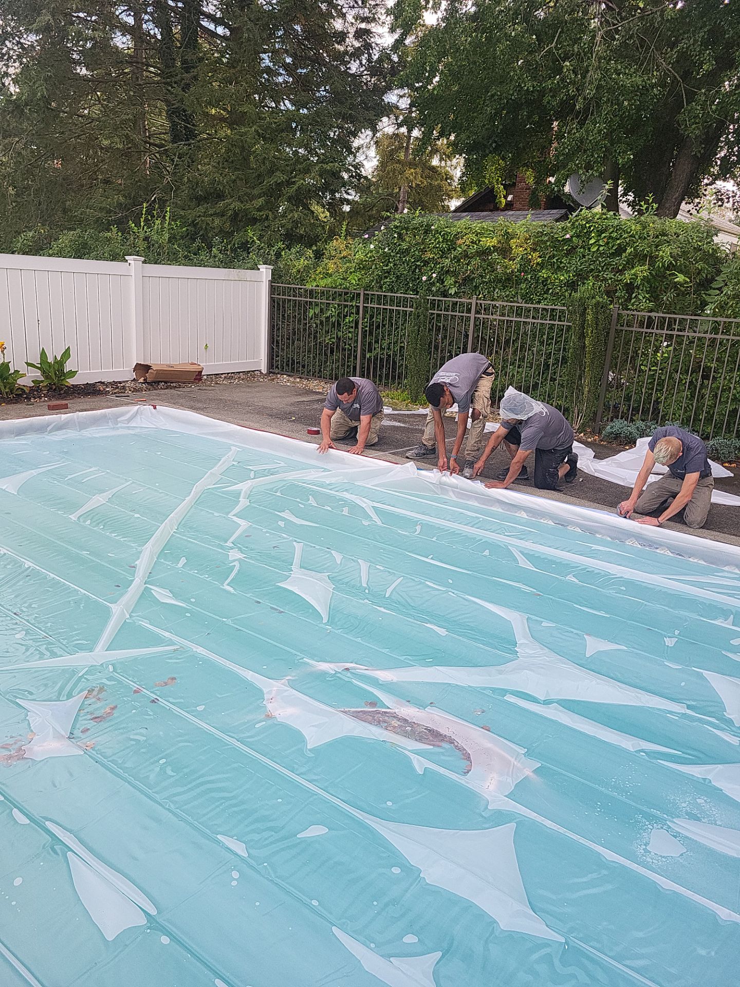 Blue Granite Pool Patio Concrete Coating in Lincoln Park by Spectrum Painting, LLC
