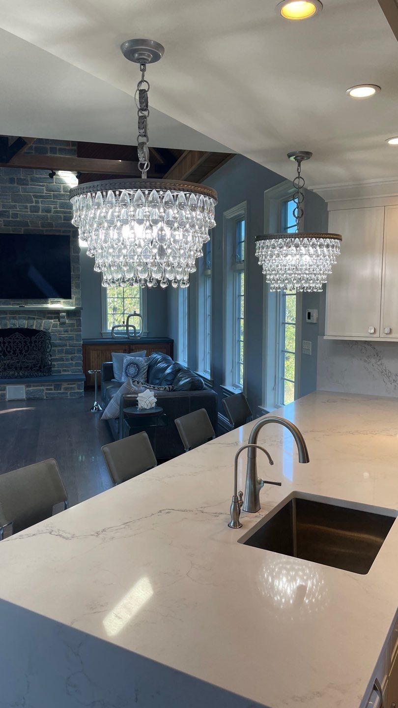 Kitchen Remodel using Fabuwood Luna Dove and Indigo Cabinetry by HomeWerkes Design & Build