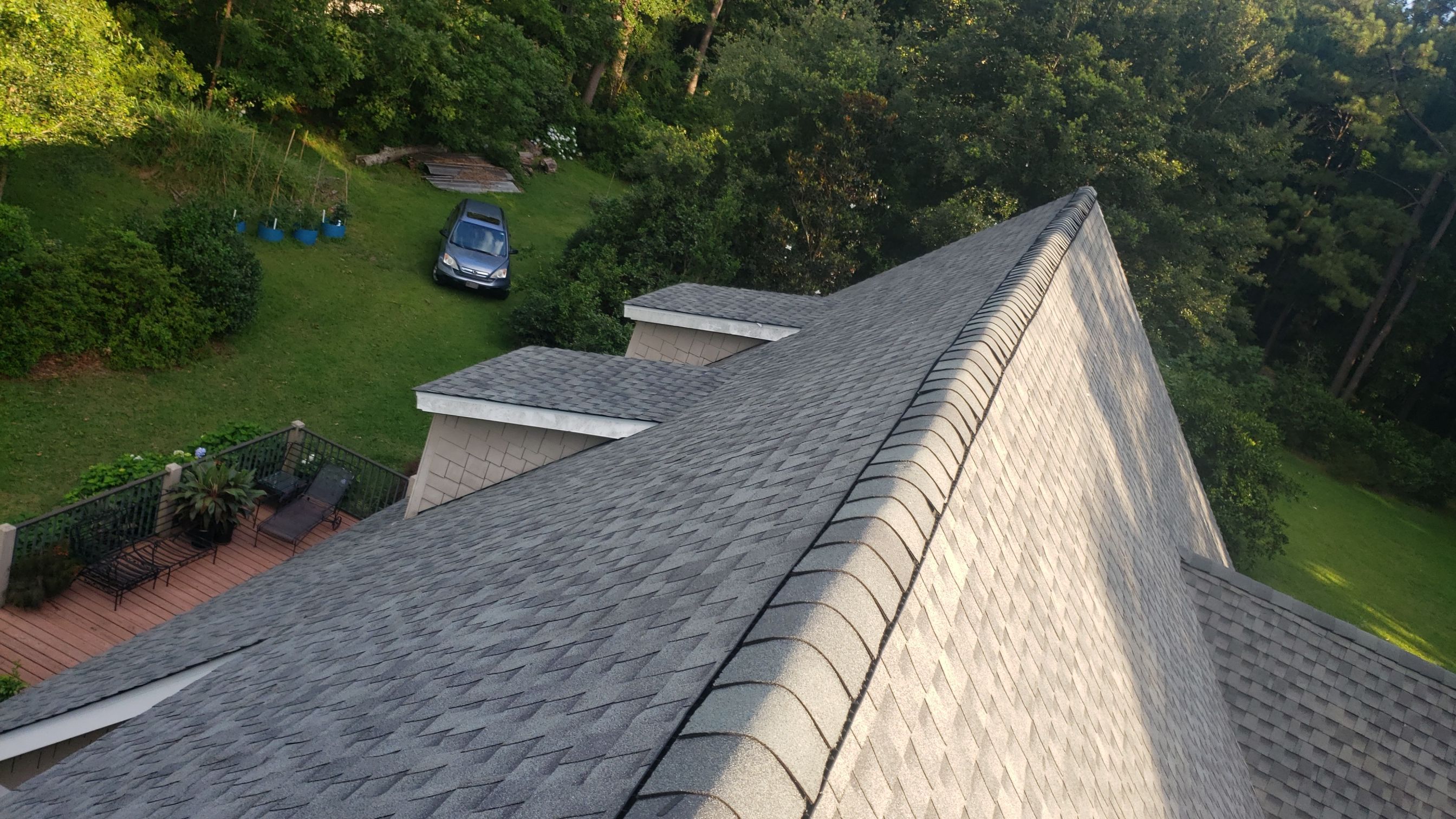 Residential Roofing Installation using Roof Replacement by American Roofing & Construction LLC