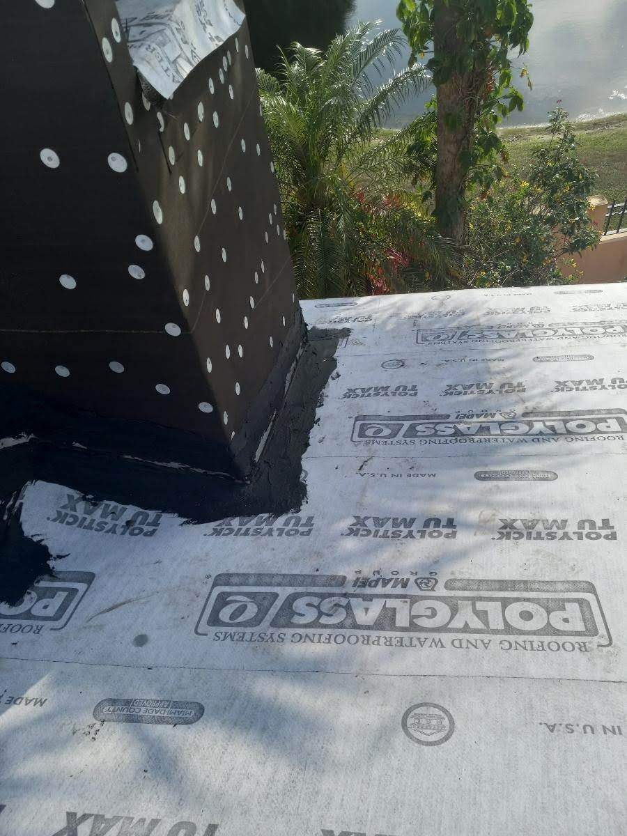 Complete Chimney Rebuild + Tile & Flat Re-Roof  by Morton Roofing, Inc.