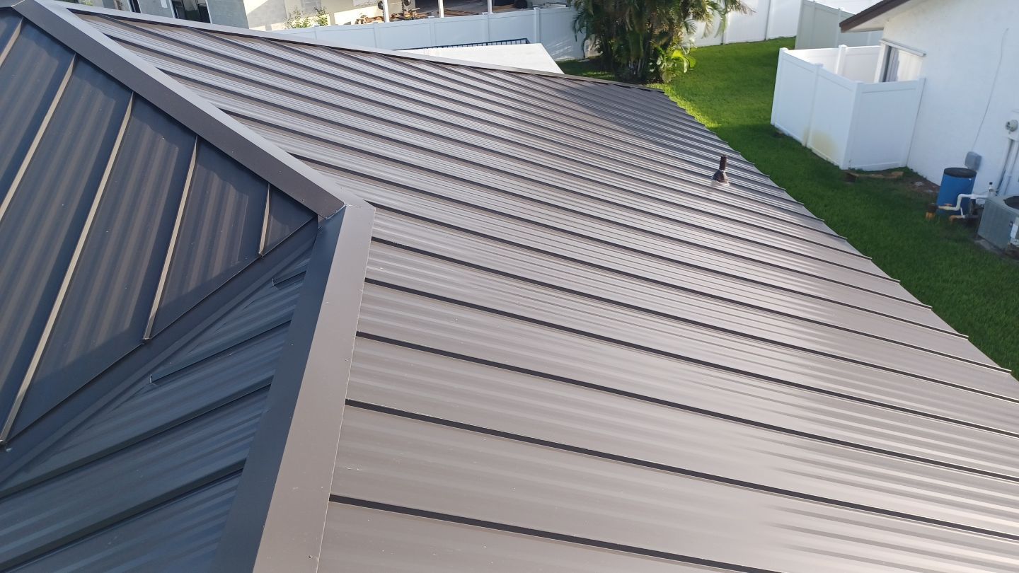 Residential Roofing Installation using 1" Nail strip metal roof by BLUES BROTHERS CONSTRUCTION CORP