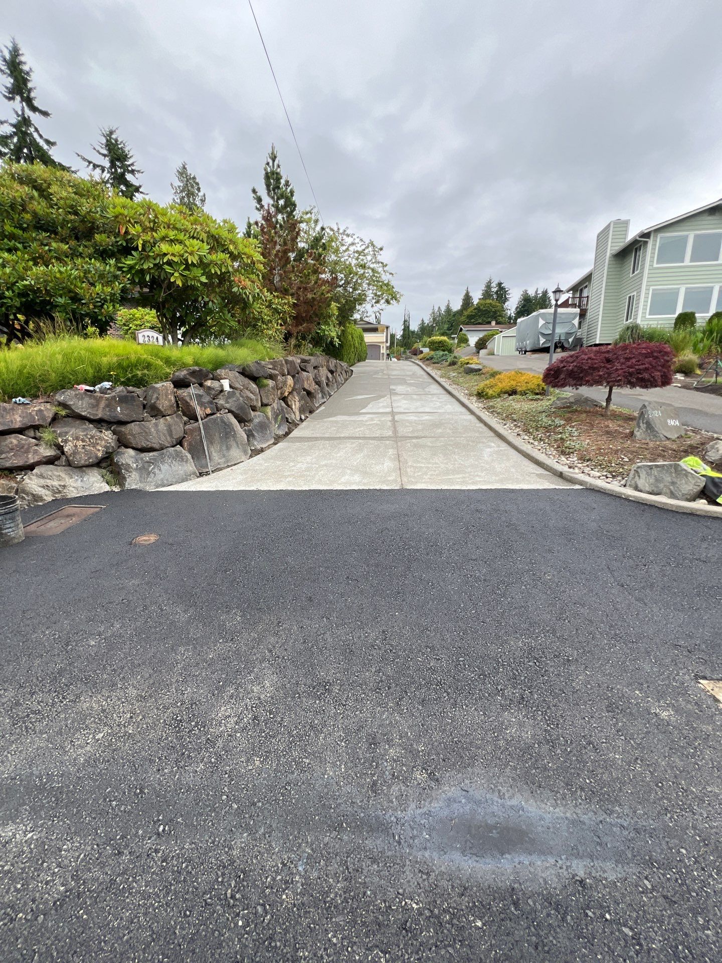 Concrete Driveway Makeover w/ Asphalt Patch | Everett  by Jireh Asphalt & Concrete Inc 