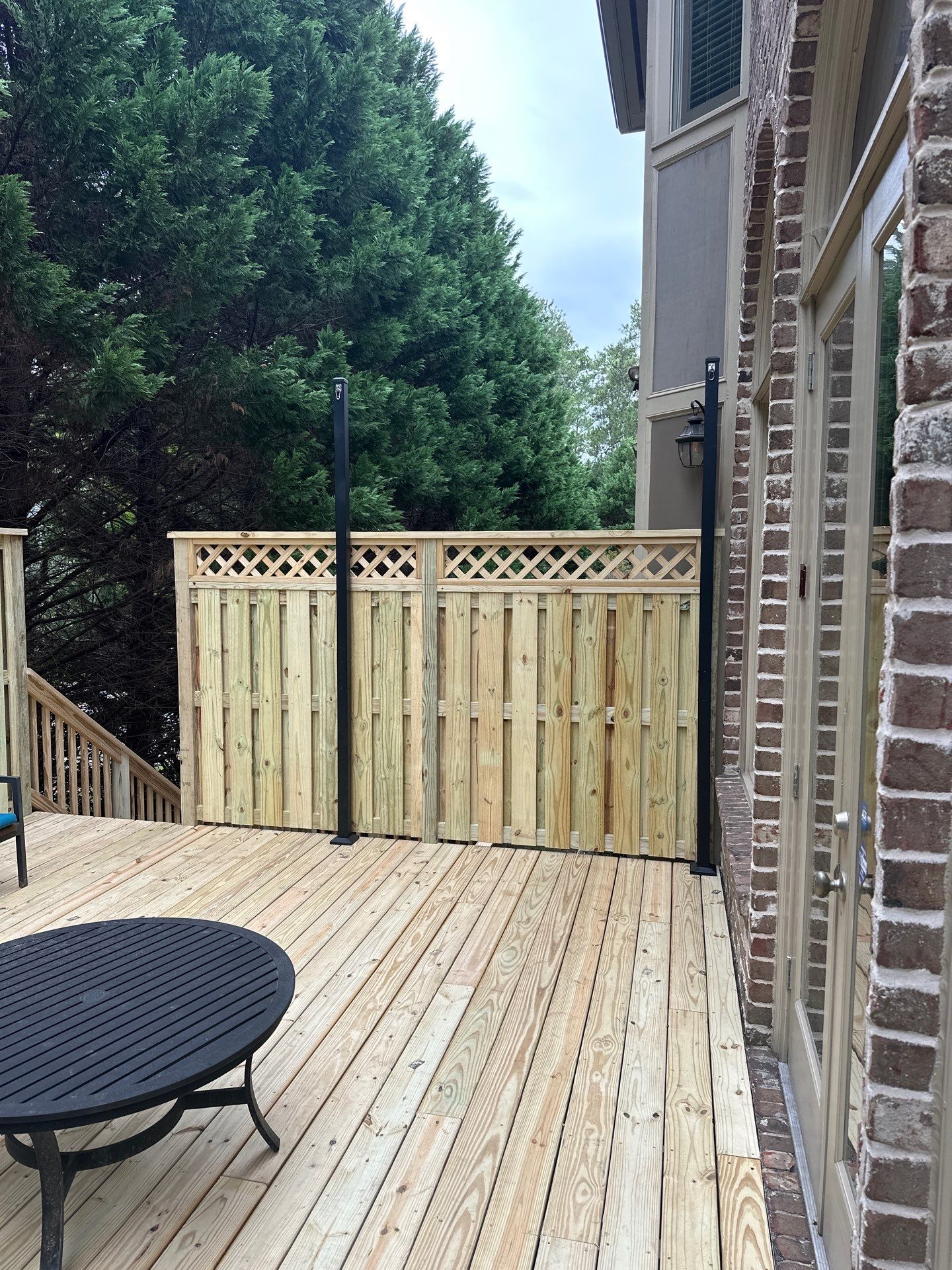 Decatur, GA Deck Resurface and Privacy Wall Build Using Pressure Treated Pine by Nelson Exteriors 