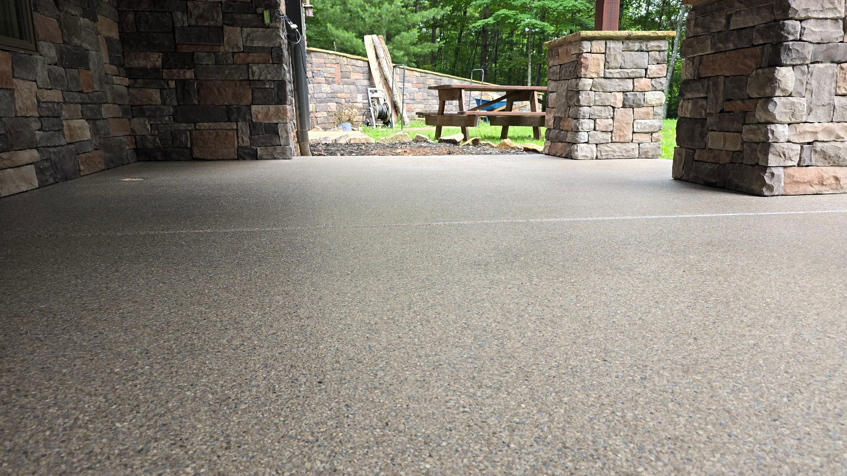Patio using Obsidian by Elite Floor Solutions
