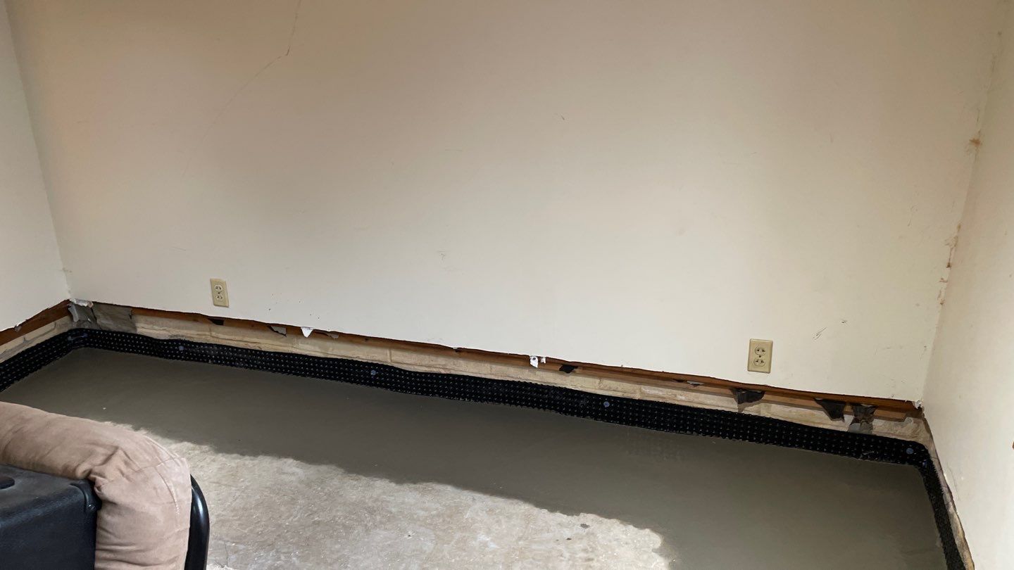 Completing the Connection for Lisa's Drain Tile System by Waterproofing Northeast