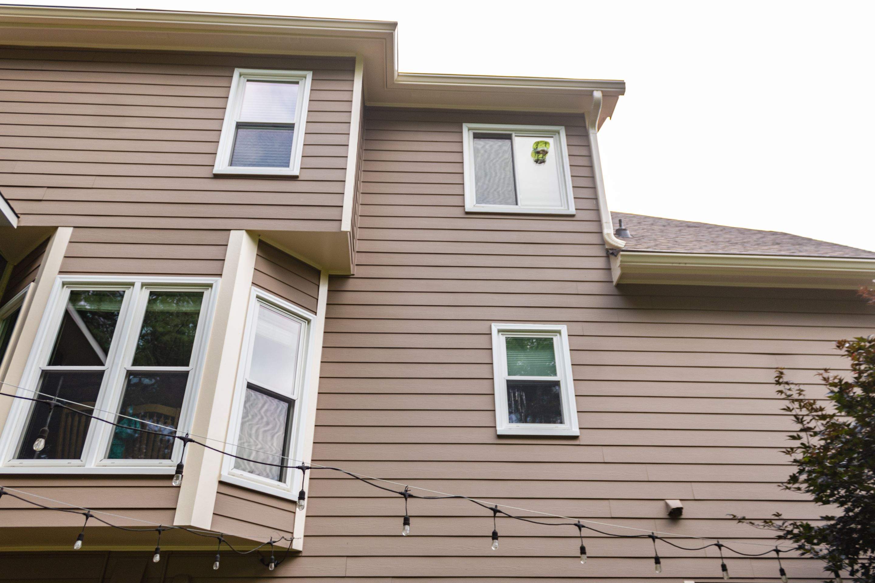 Exterior Painting using Sherwin-Williams and Rotted Wood Replacement by Nelson Exteriors 