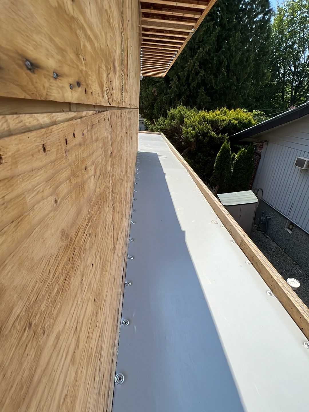 Residential Roofing Installation using Durolast roofing membrane by Top Notch Roofing Inc