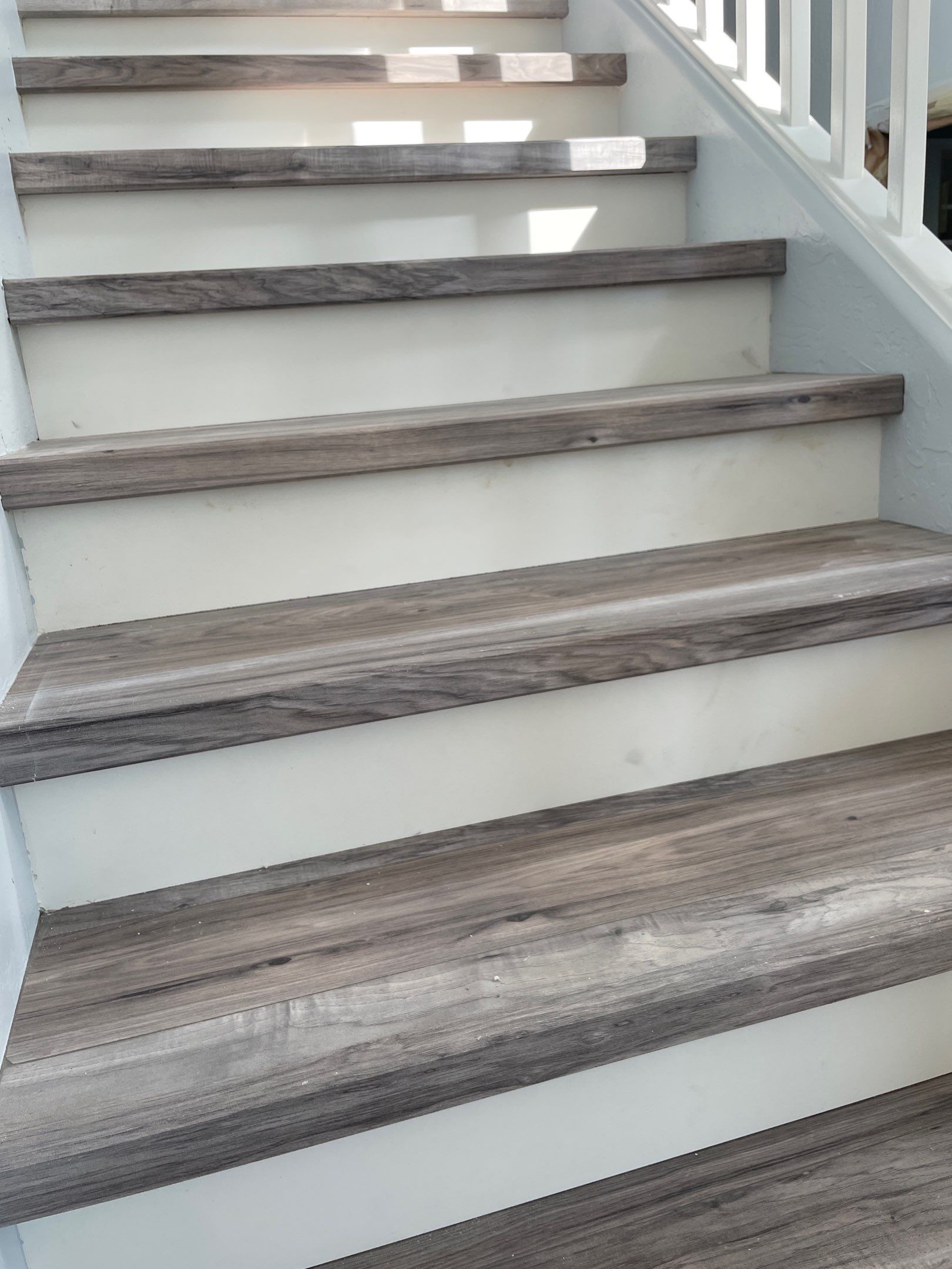 Laminate Staircase and Flooring  by Footprints Floors of Chandler 