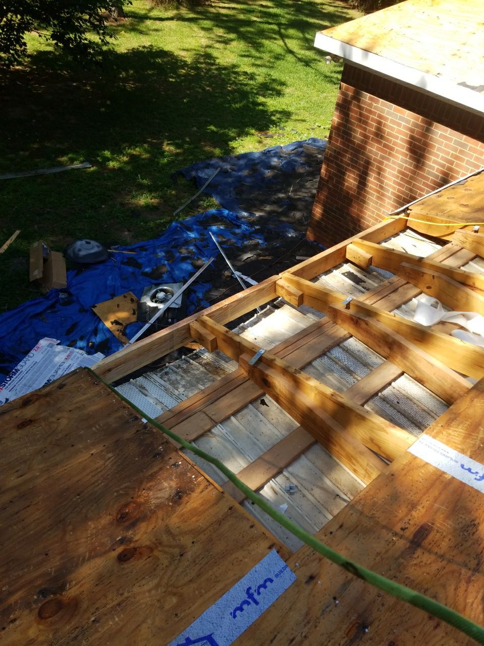 Residential Roofing Installation using Roof Replacement by American Roofing & Construction LLC