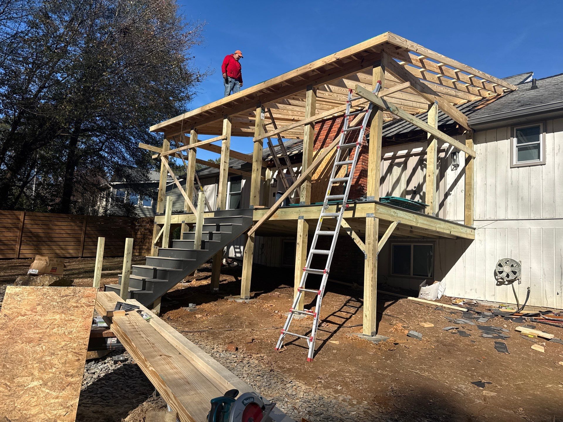 Deck and Shed Roof Style Covered Build using Trex Decking Products by Nelson Exteriors 