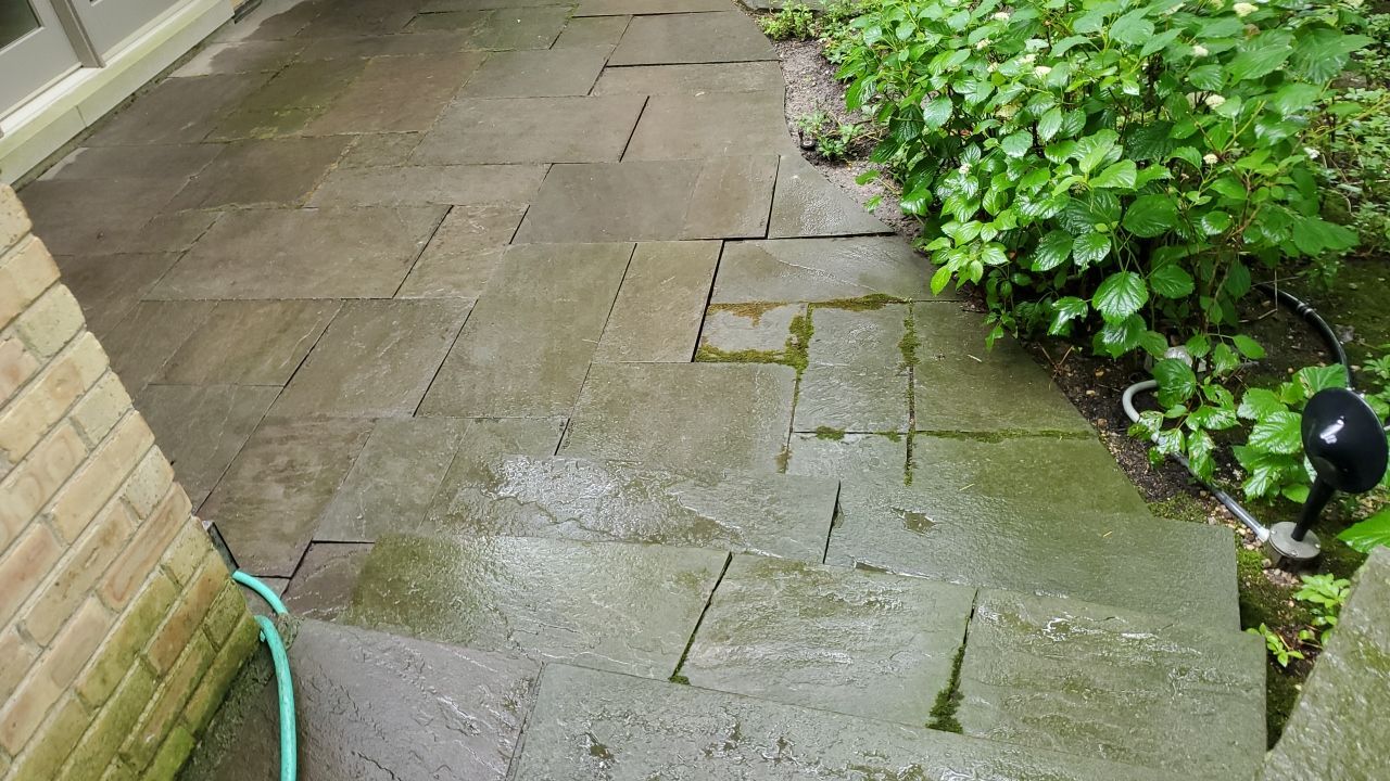 Bluestone patio cleaning by Northern Power Washing LLC.