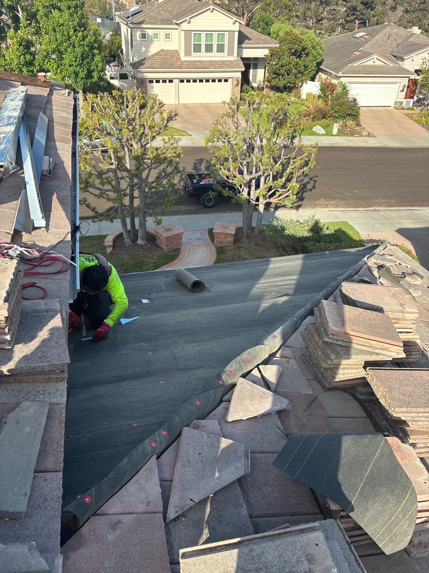 Carlsbad Concrete Tile Roof Replacement with Copper Flashing and Skylights by Reliable Roofing San Diego Inc.