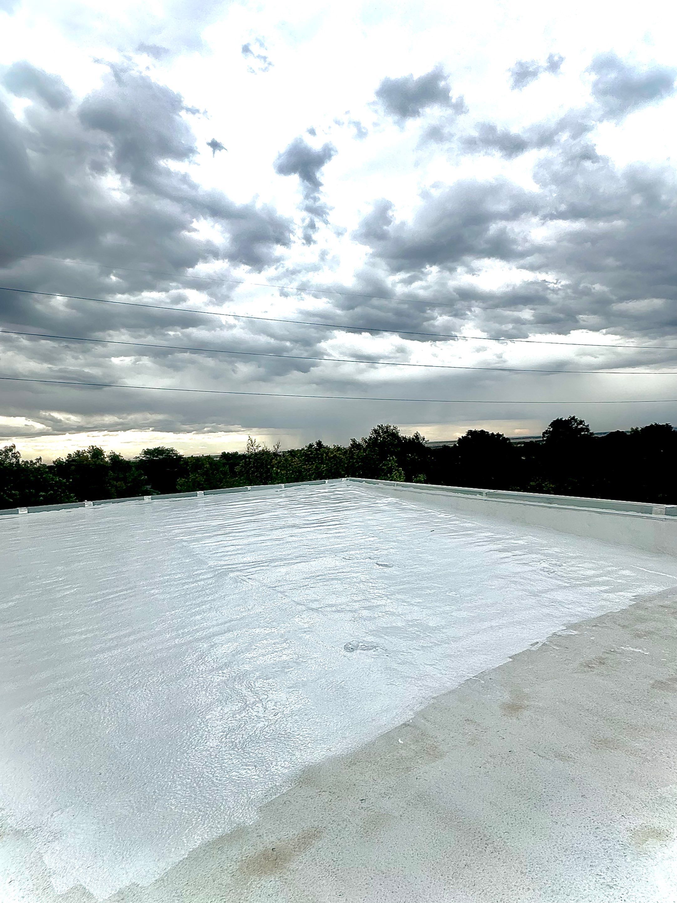 SPF coated with 100% Silicone Coating by Rhino Roofing LLC