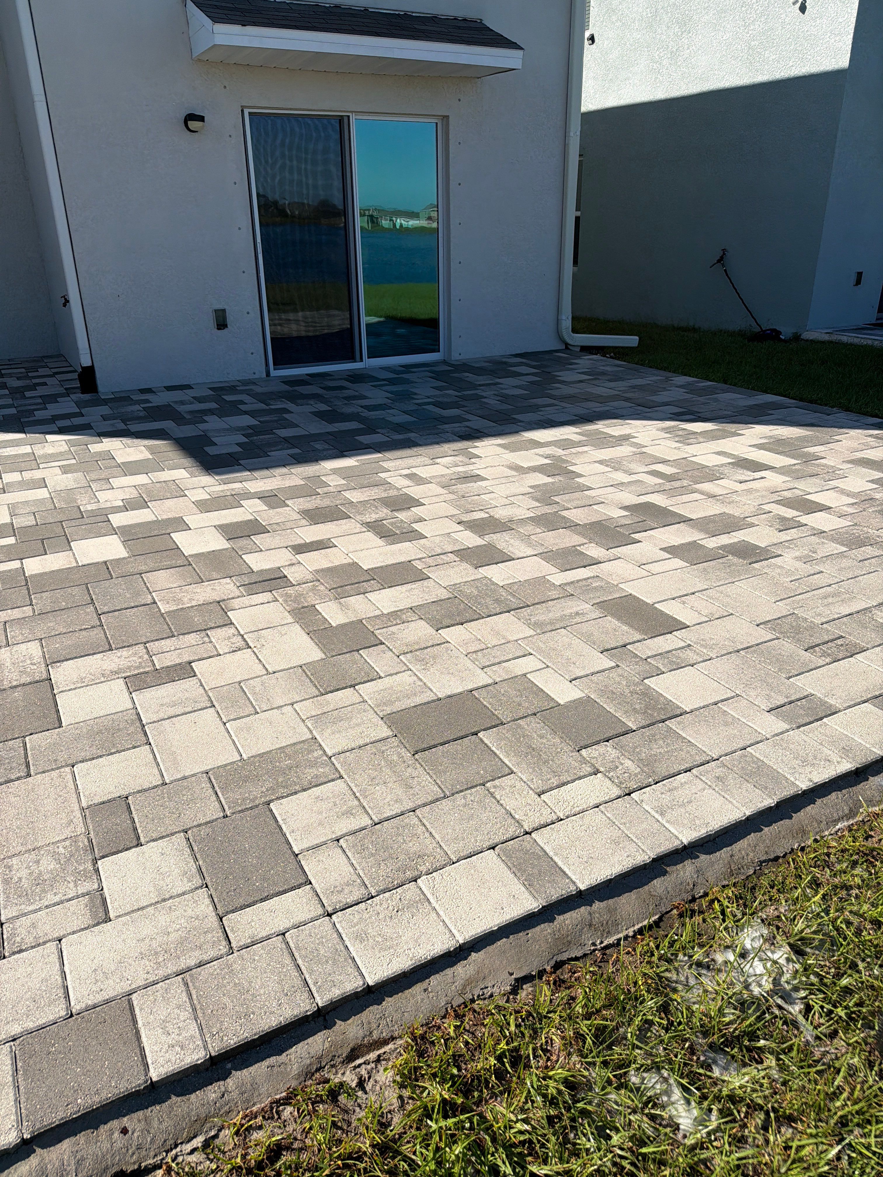 Paver Sealing and Restoration for Large Multi-Toned Patio in Wimauma by Supreme Paver Experts