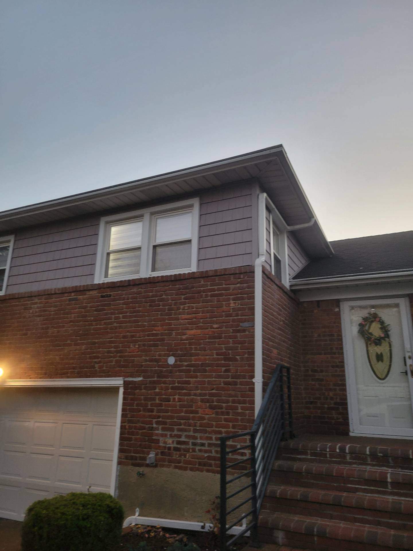 New Siding & Trim by Island Roofing Inc.