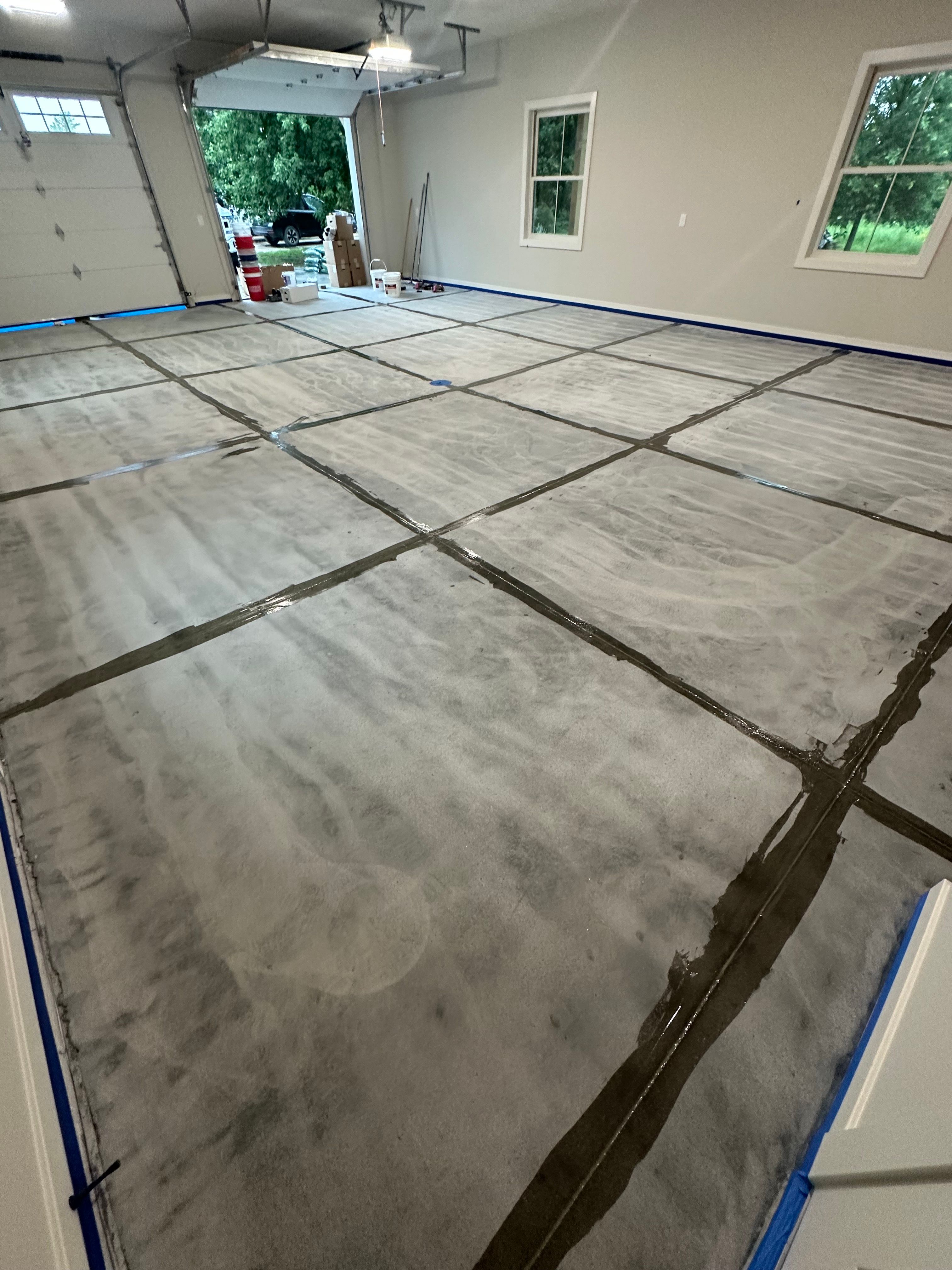 Trail Mix Epoxy Garage / Even Space by Goat Coatings