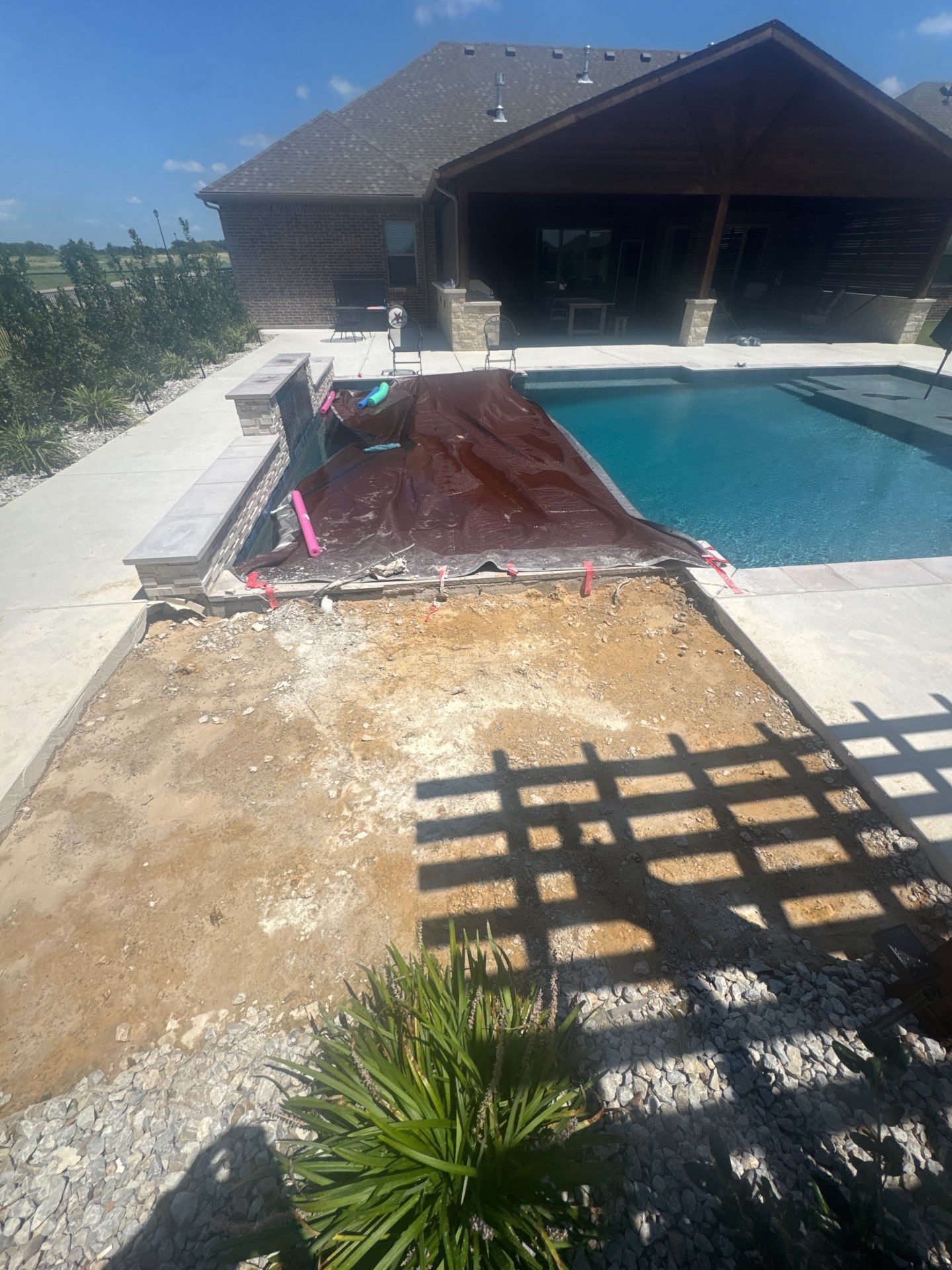 Geometric Pool with Raised Water-Feature Wall and Pergola by Pinnacle Pools and Spas - DFW
