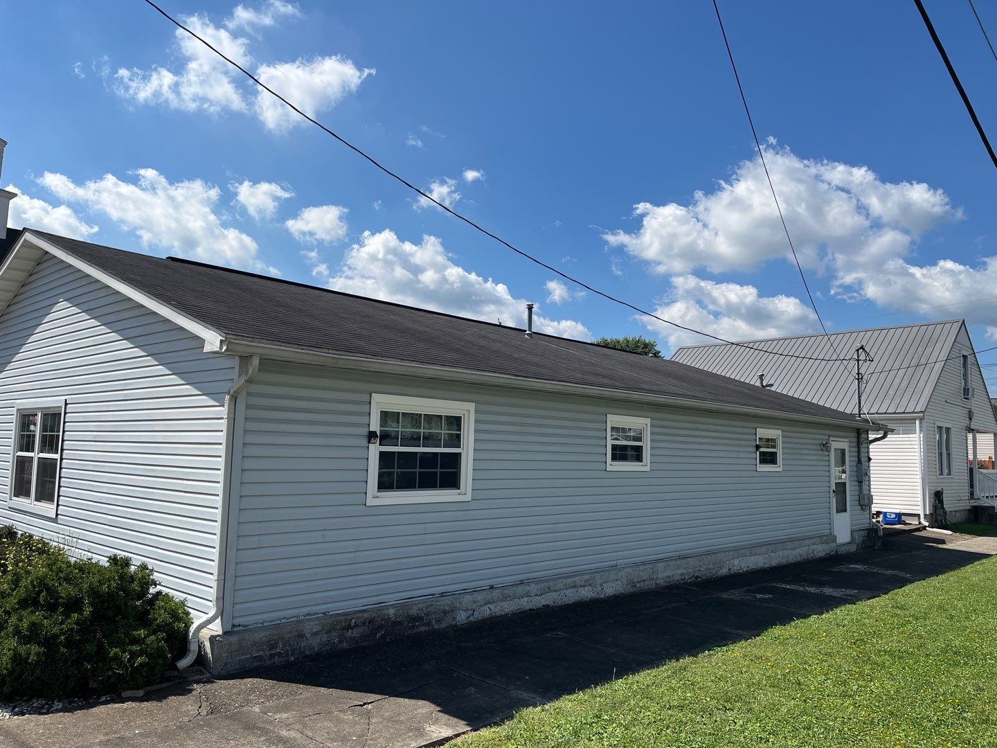 Commercial Roofing Installation using Performance Shingles by Mr. Roofer