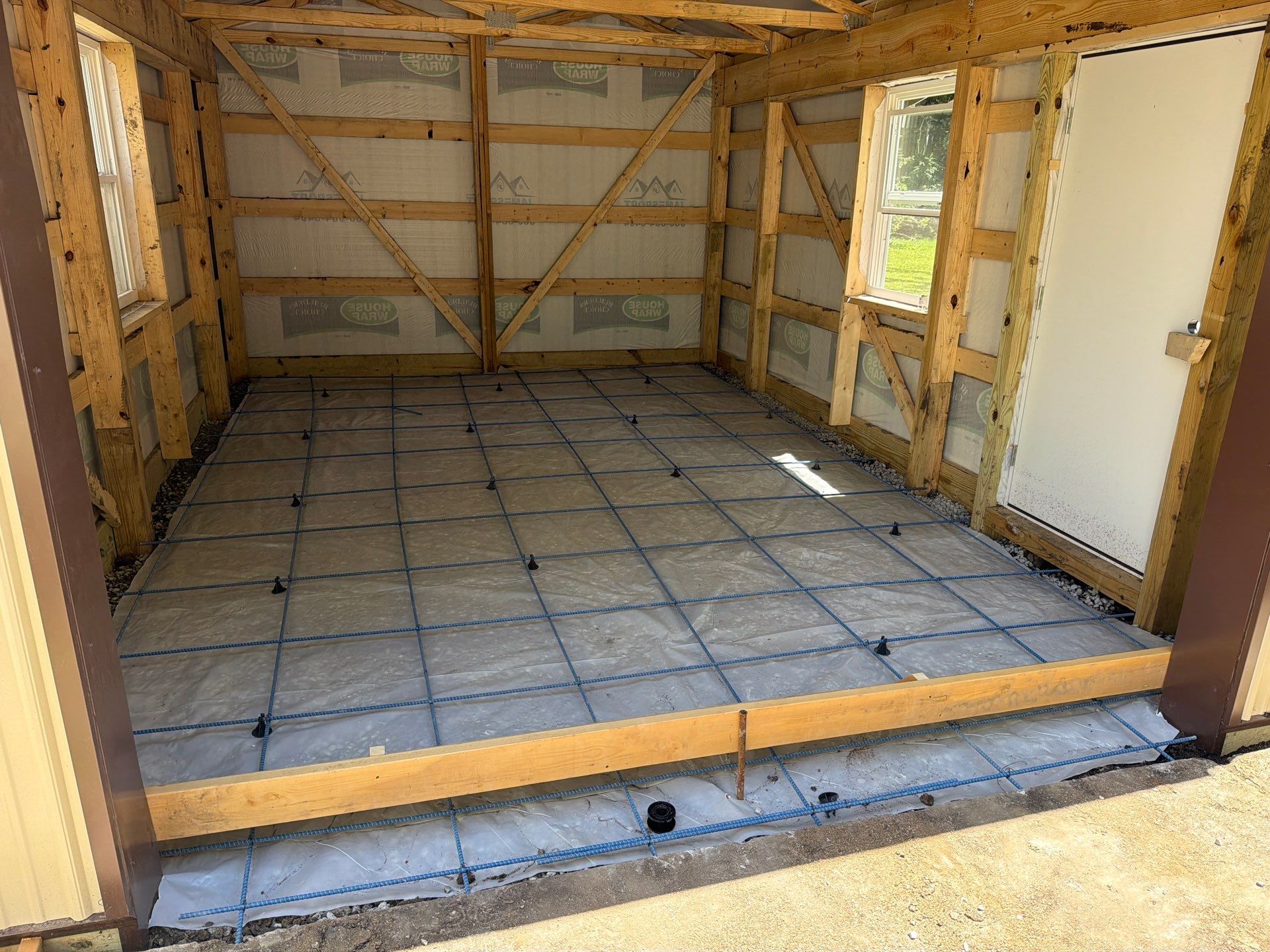Custom Post Frame Storage Building Installation in Ames, Iowa by Graber Custom Structures