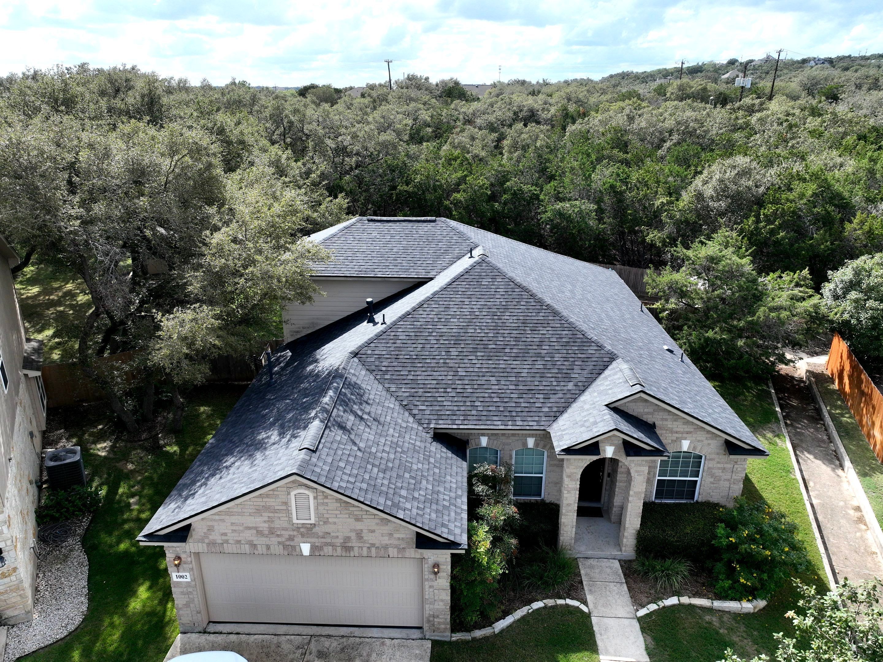 Residential Roof Replacement using Owens Corning Duration Shingles - Onyx Black  by Premier Roofing and Contracting