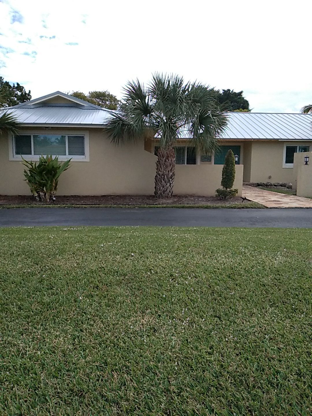 Residential Roofing Installation using 1" Nail strip metal roof by BLUES BROTHERS ROOFING
