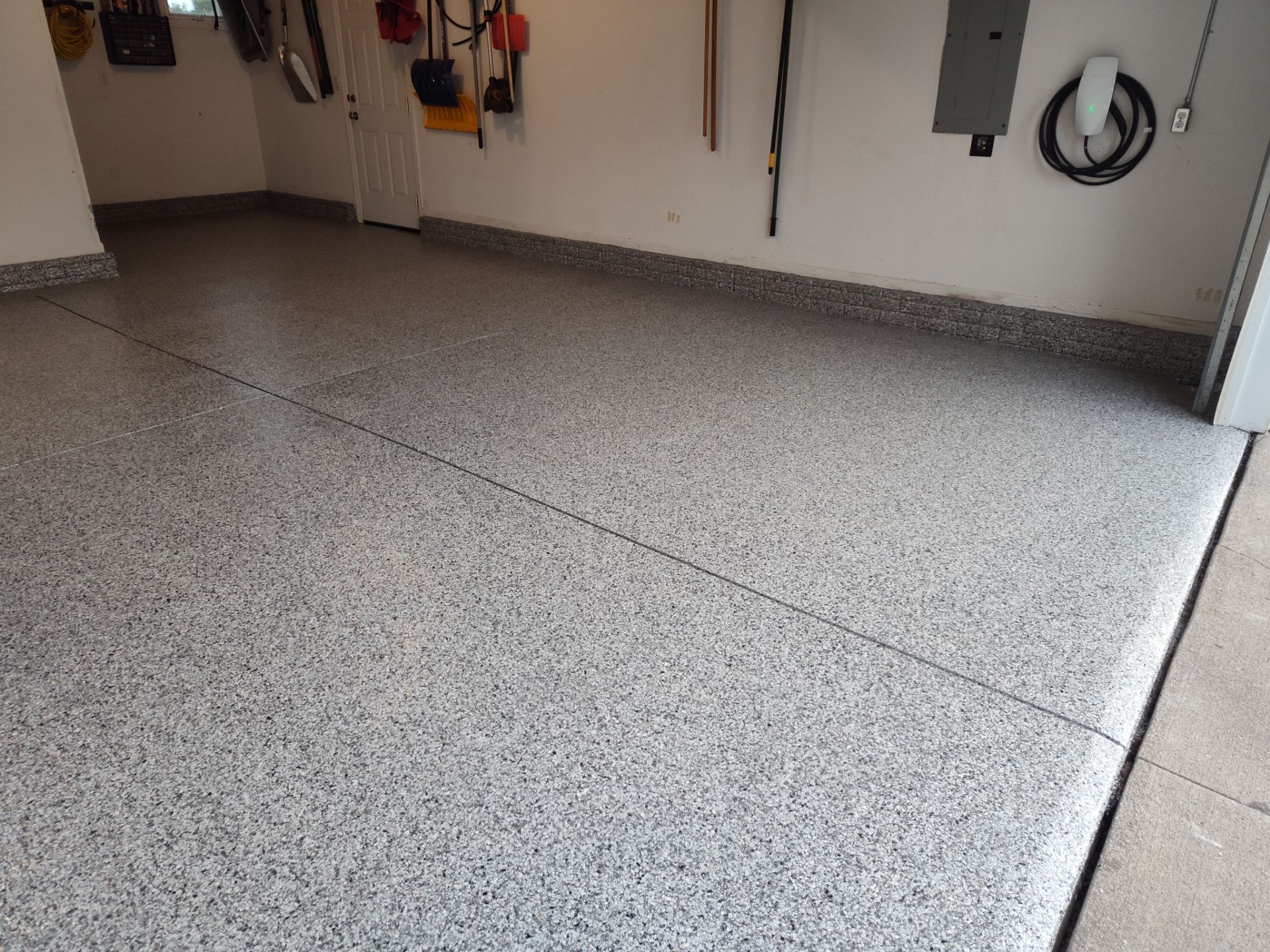 A Garage In One Day Keeps the Rock Salt Away! by Revival Concrete Coatings