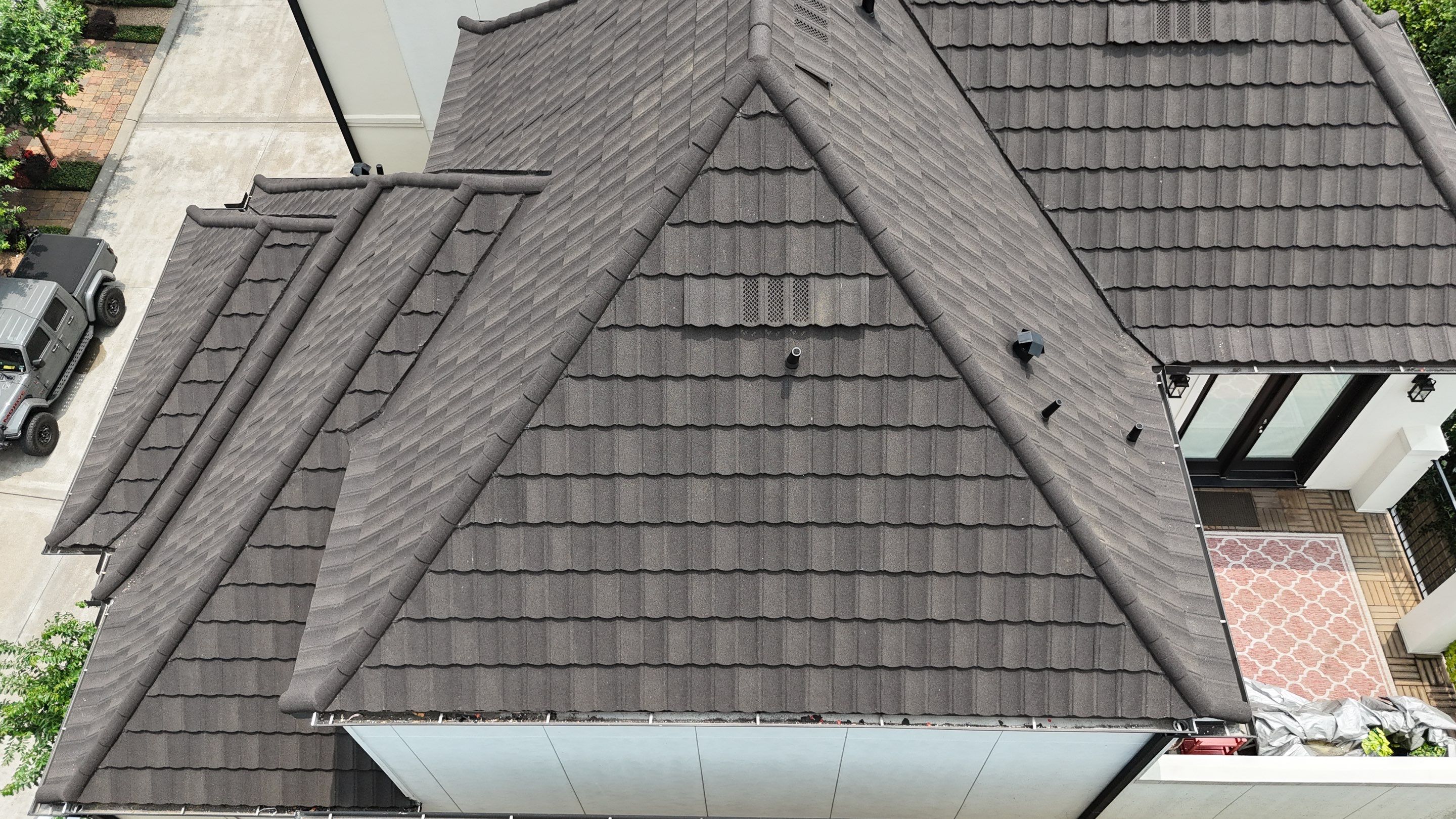 Stunning transformation from Shingles to DECRA Tile by Core Four Roofing