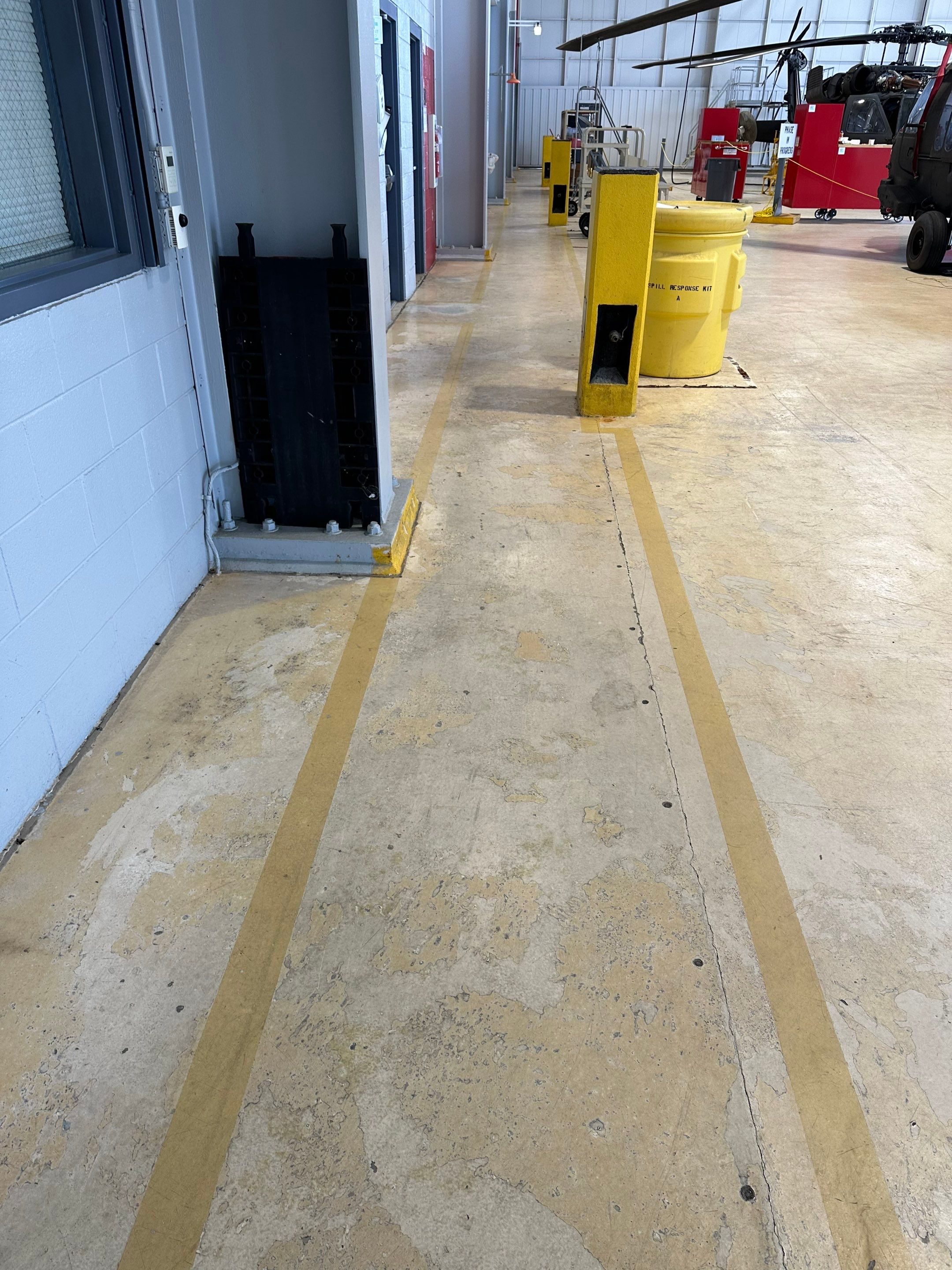 Industrial Epoxy Flooring for Army National Guard Hangar in Mobile by Cornerstone Hard Surface Restoration 