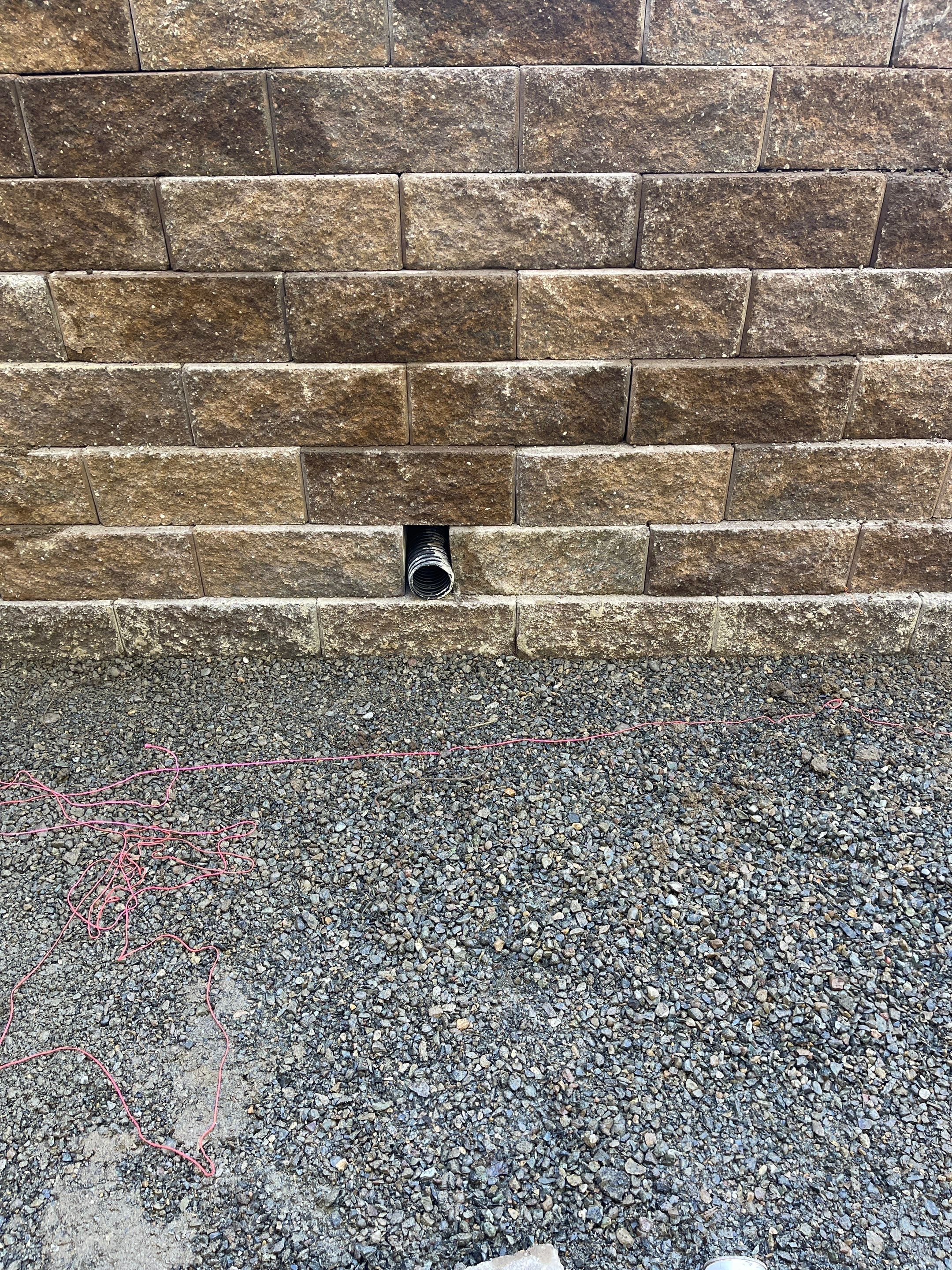 Lorra | Asphalt Driveway Repair & Retaining Wall by Jireh Asphalt & Concrete Inc 