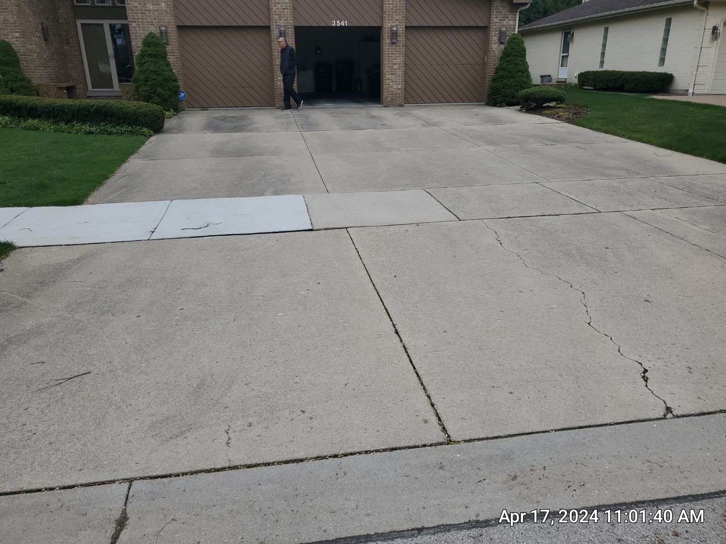 concrete patio and driveway cleaning by Northern Power Washing LLC.