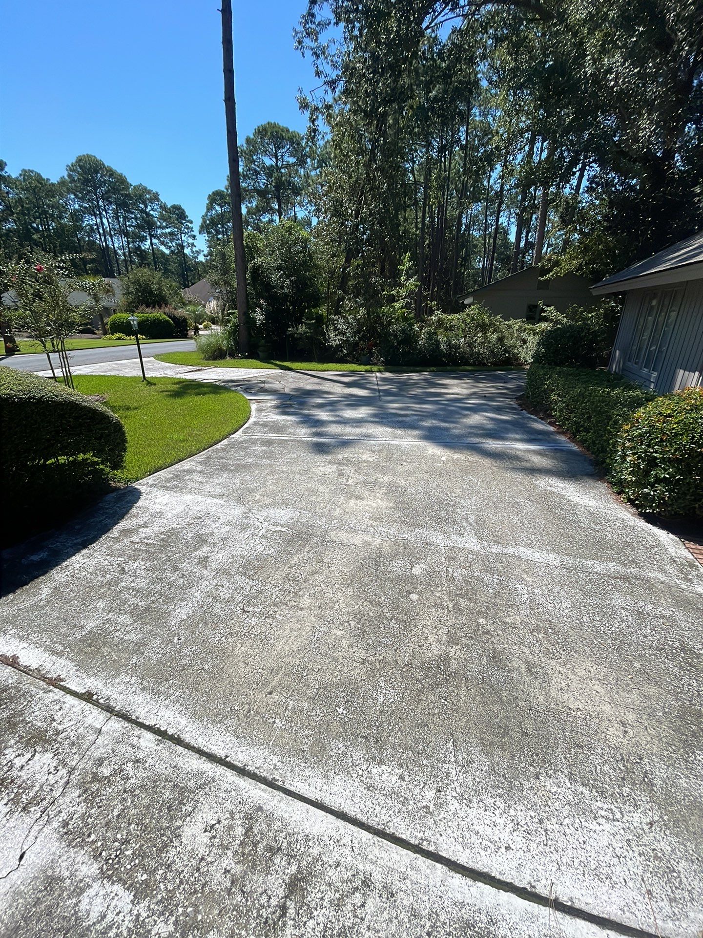 Concrete Driveway Replacement with Decorative Paver Inlay in Hilton Head Island by Lowcountry Scapes, LLC