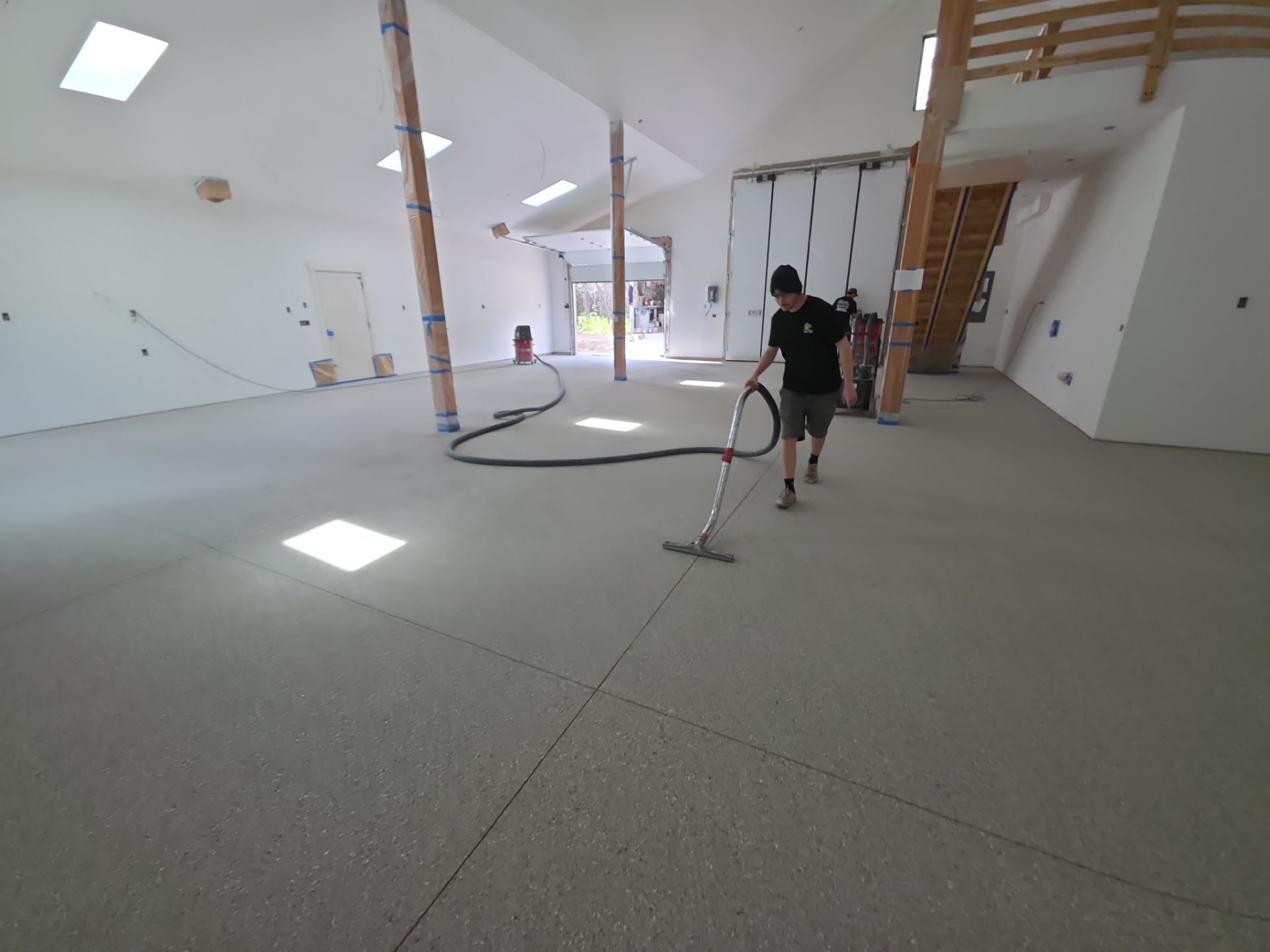 Claystone Hybrid Concrete Floor Coating for Newport Shop Transformation by Croc Coatings, LLC