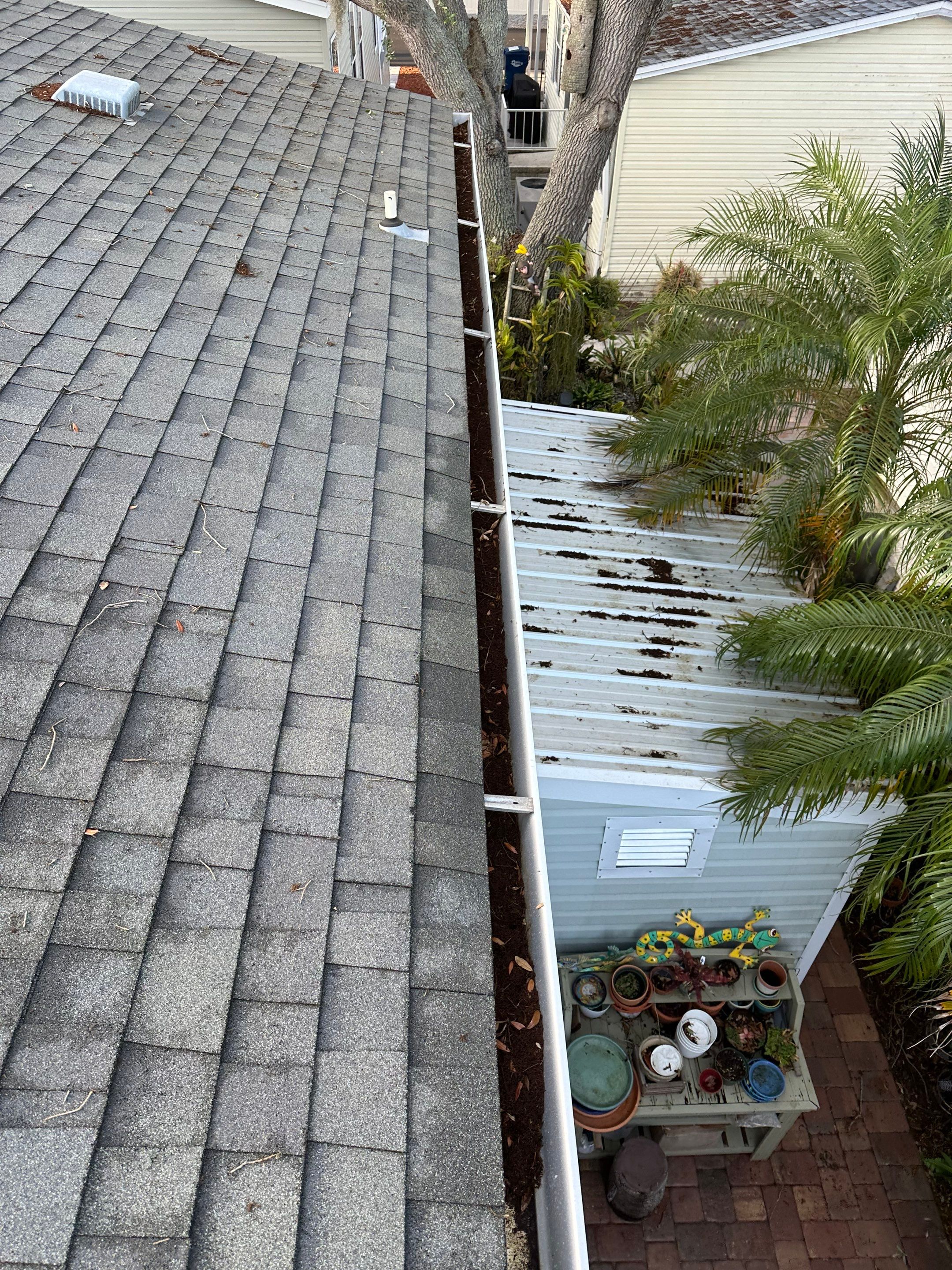 Gutter Cleaning and House Washing Services  by Sunshine AquaWash