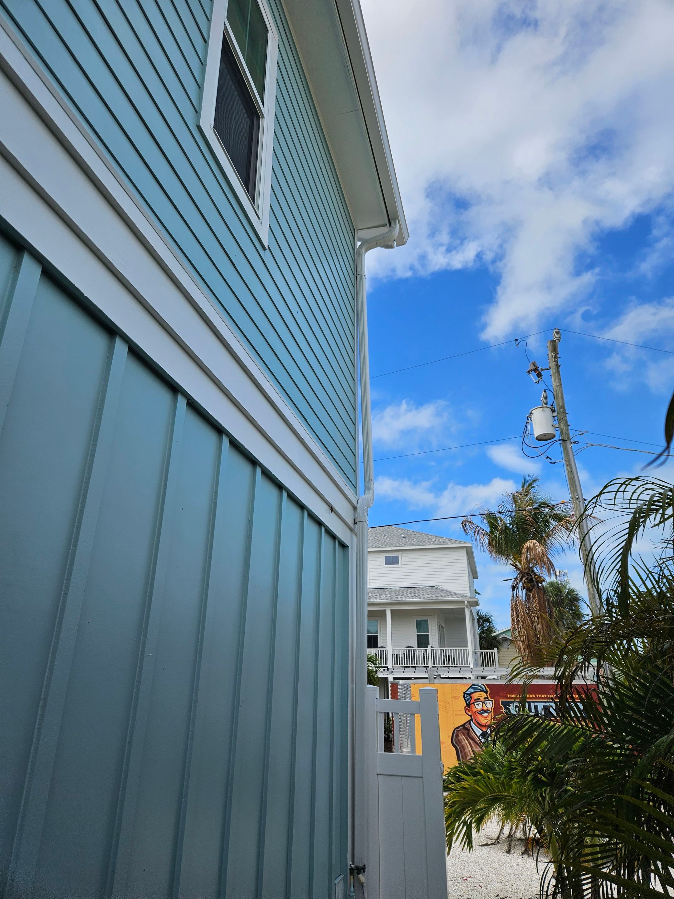 New White Seamless Gutters Installation and Downspouts, Reseal Gutters in Fort Myers Beach, FL  by Gutter Professors