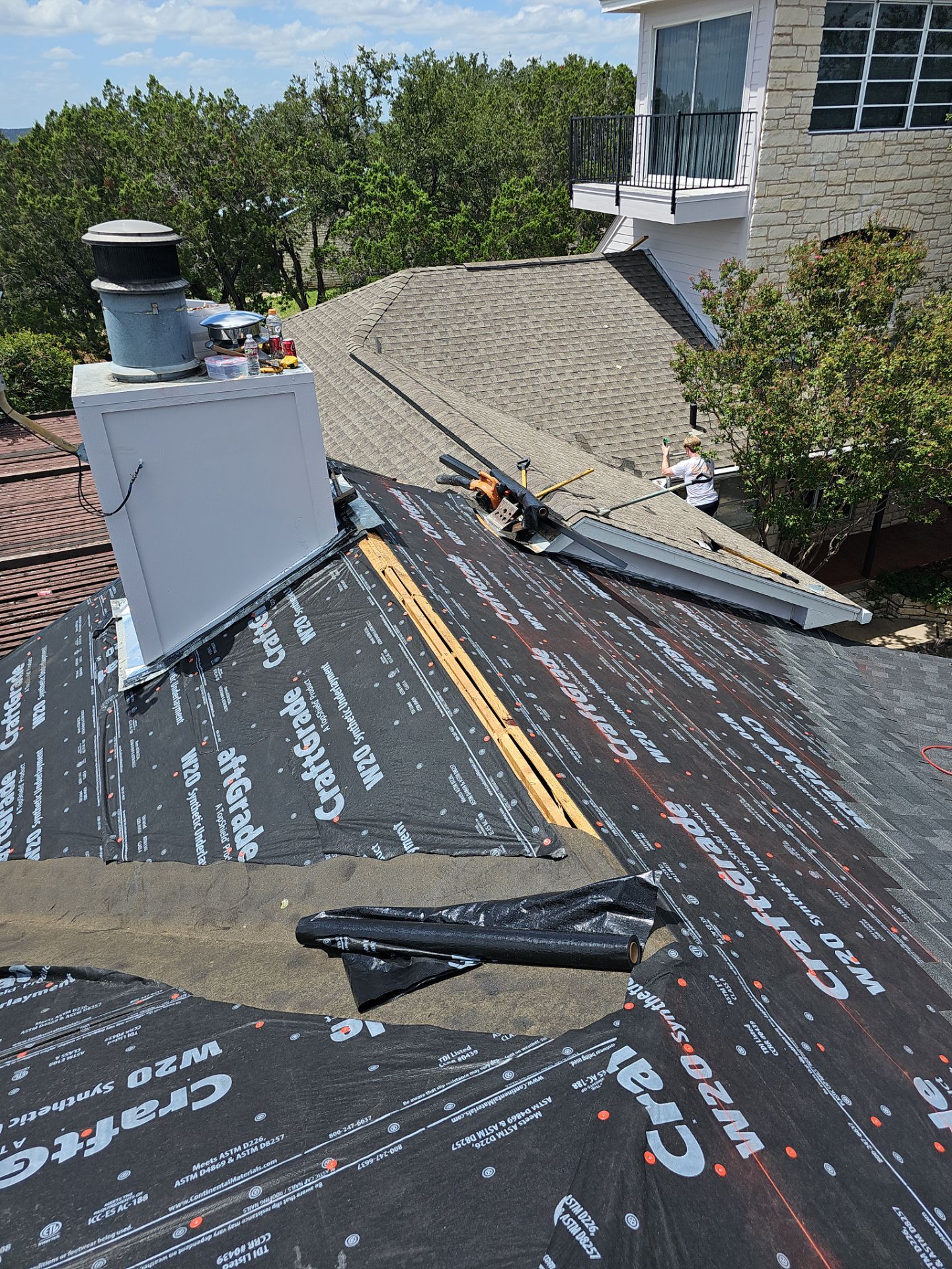 Residential Roofing Installation using IKO Nordic Granite Black by DeZign Roofing & Exteriors