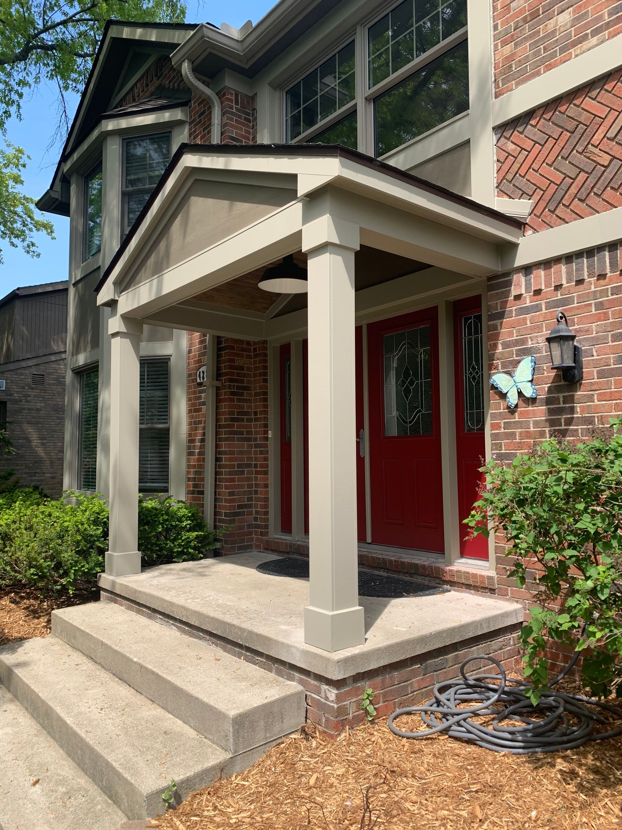 James Hardie Siding Replacement & Porch Addition by Bloomfield Construction & Restoration