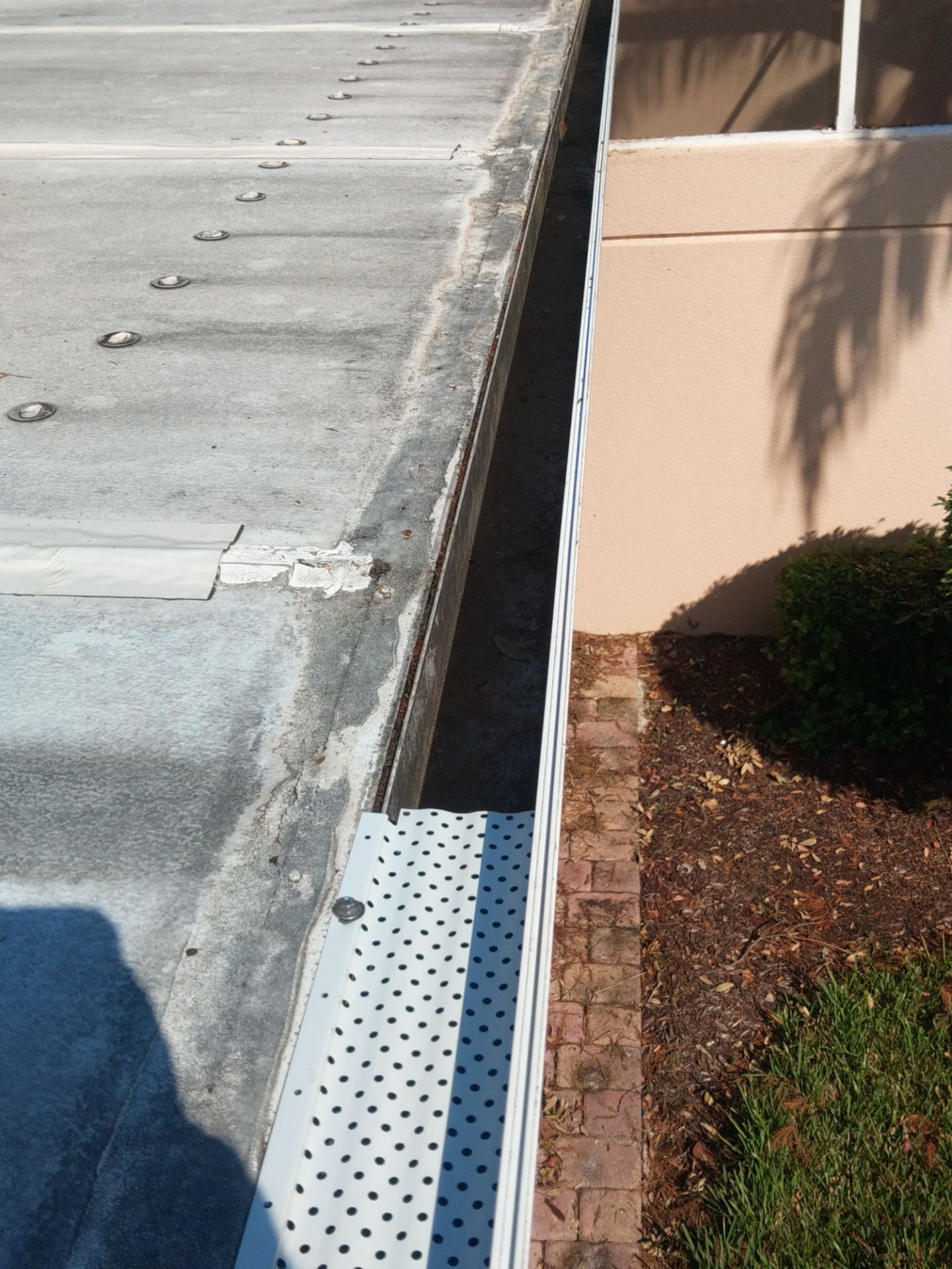 Commercial Gutter Maintenance in Sarasota FL by Gutter Professors