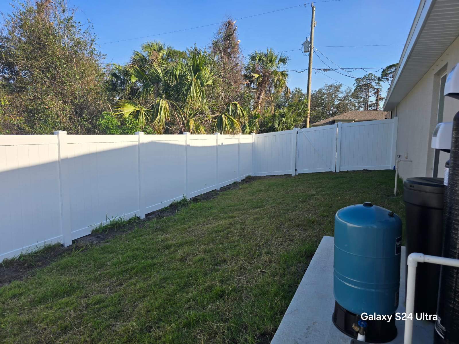 Residential White Vinyl Privacy Fence Installation in North Port by True Fence LLC