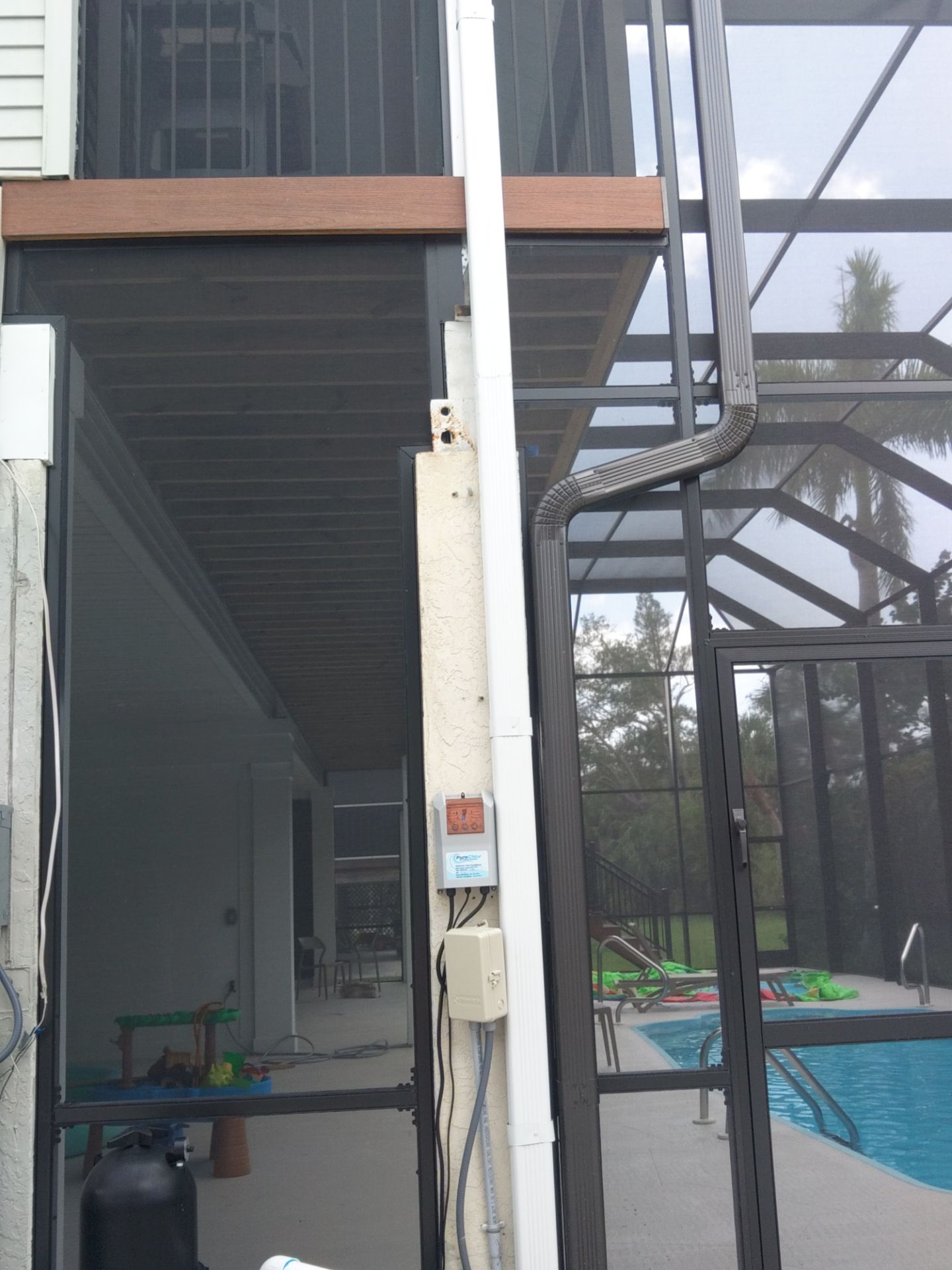 Complete Gutter System with Downspouts & Guards in Fort Myers Beach FL by Gutter Professors